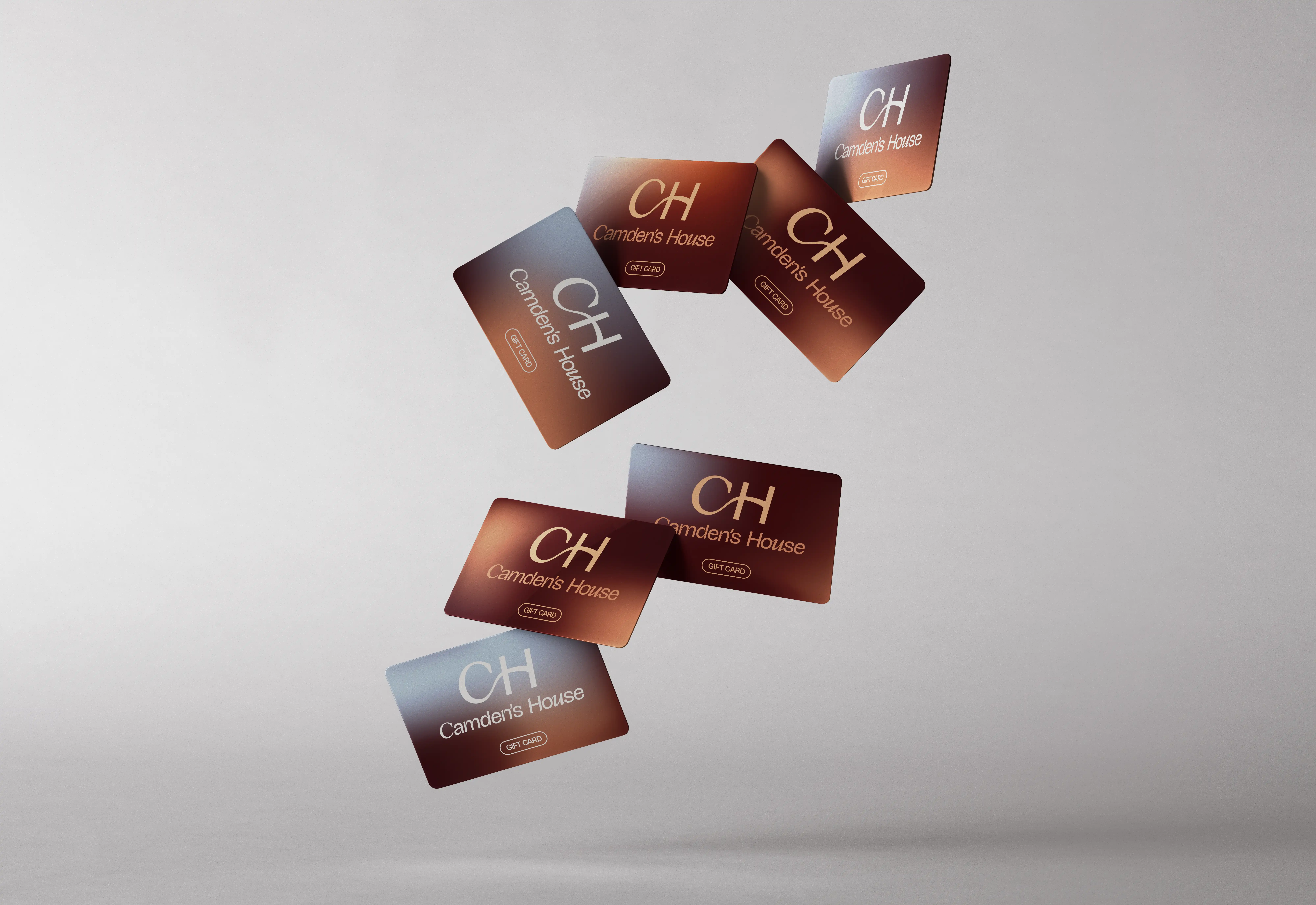 Camden's House brand identity — gift cards design with CH monogram and gradient backgrounds