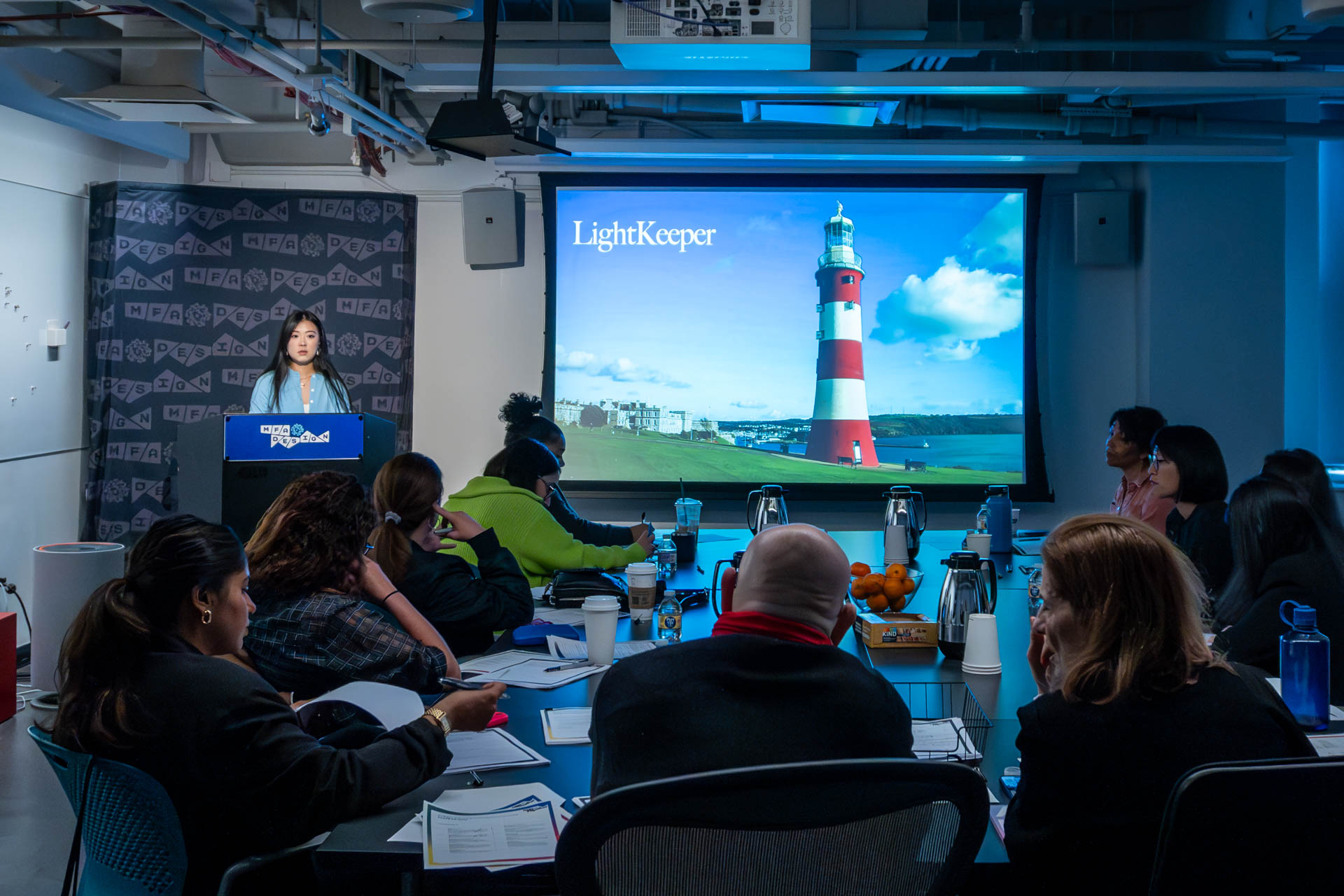 student at a podium giving a presentation