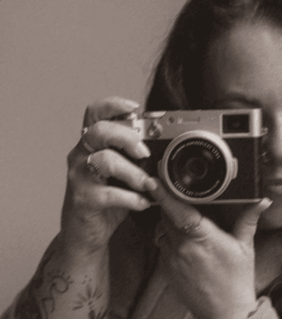 Photographer holding camera