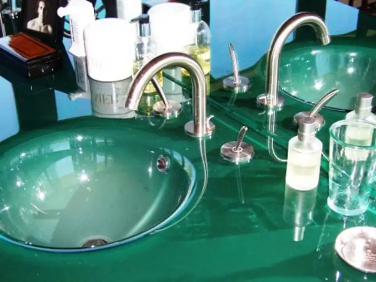 Green glass integral sink with stainless faucet