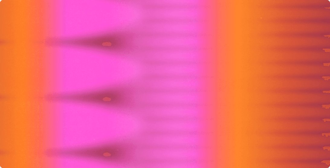 Two young children stand facing a large glass window covered in colorful drawings, doodles, and handwritten notes in yellow and blue marker. One child points at the glass while the other looks on.