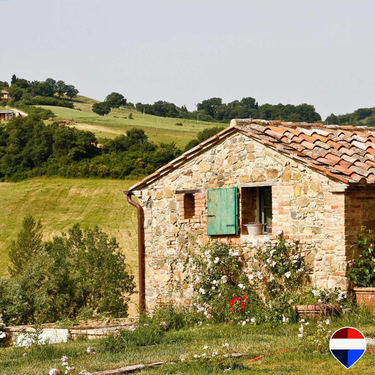Stone country house set among the hills of the Tuscan Maremma