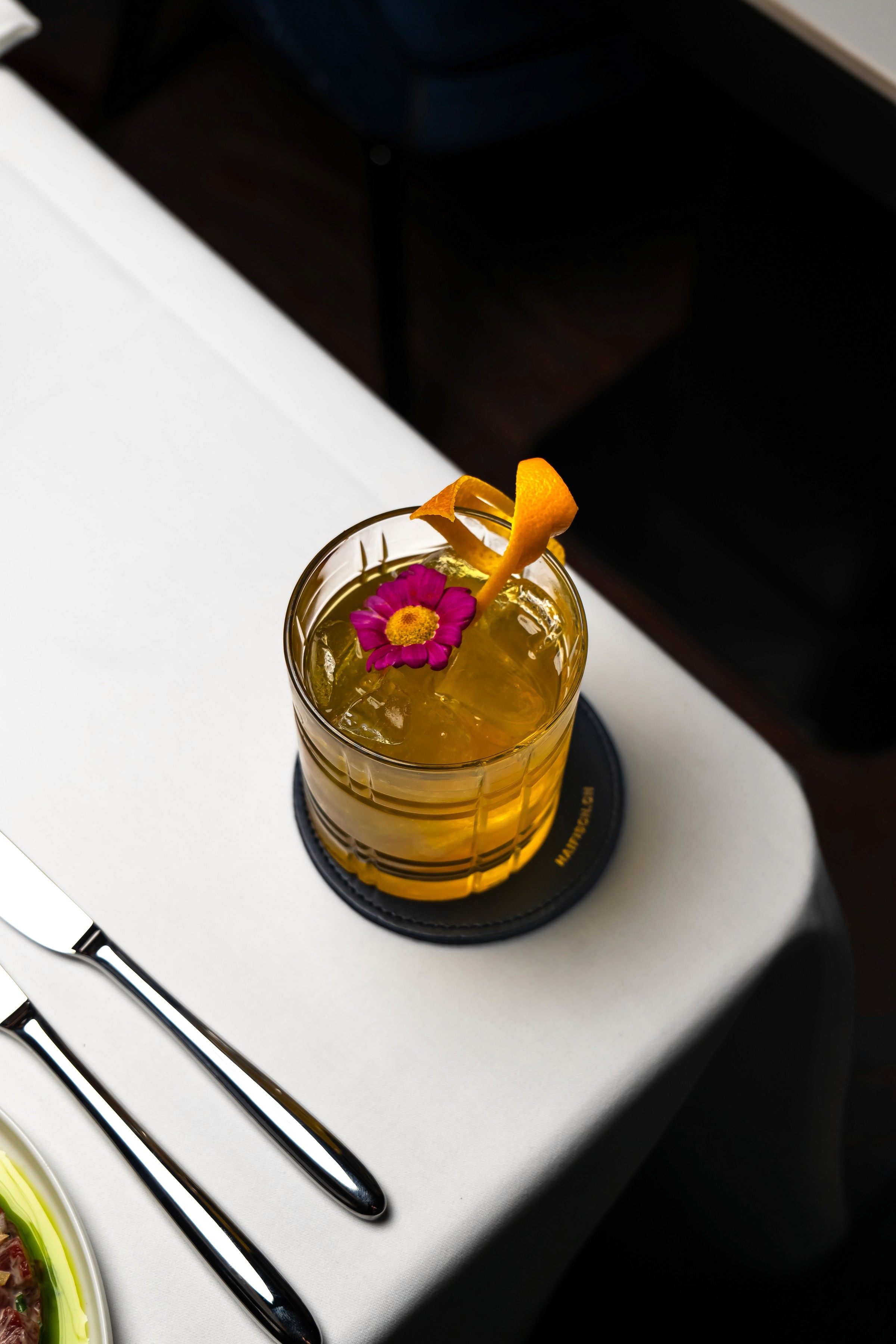 two people looking at a tablet and smiling