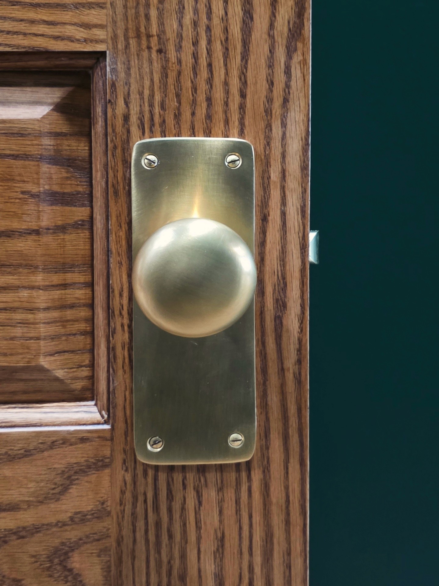 close up of a handcrafted-woodendoor with arched