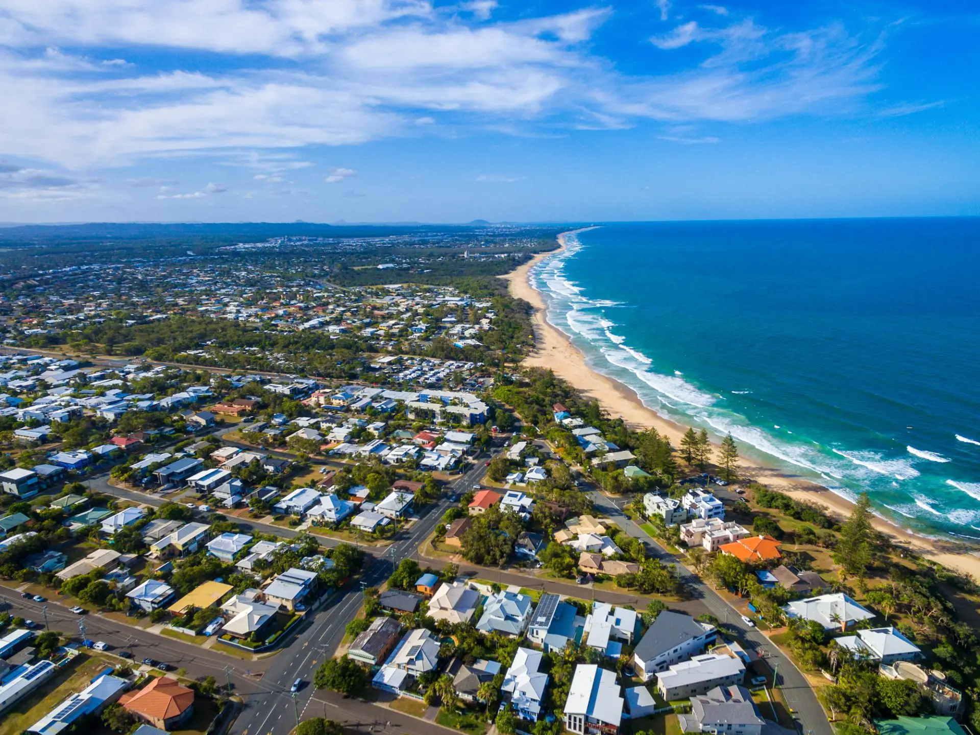 Aerial view of coastal town and ocean