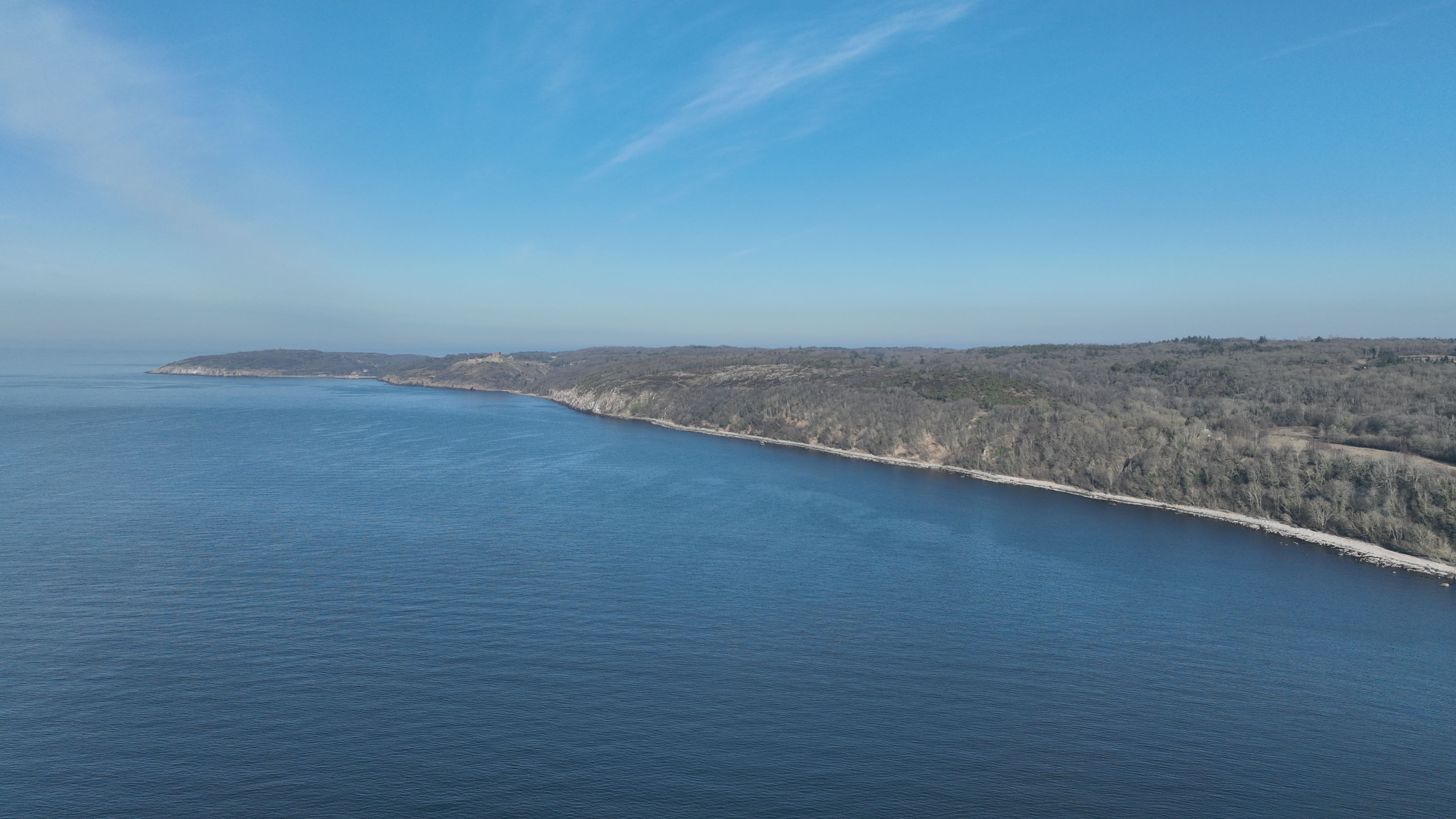 a blue square object on a wooden surface