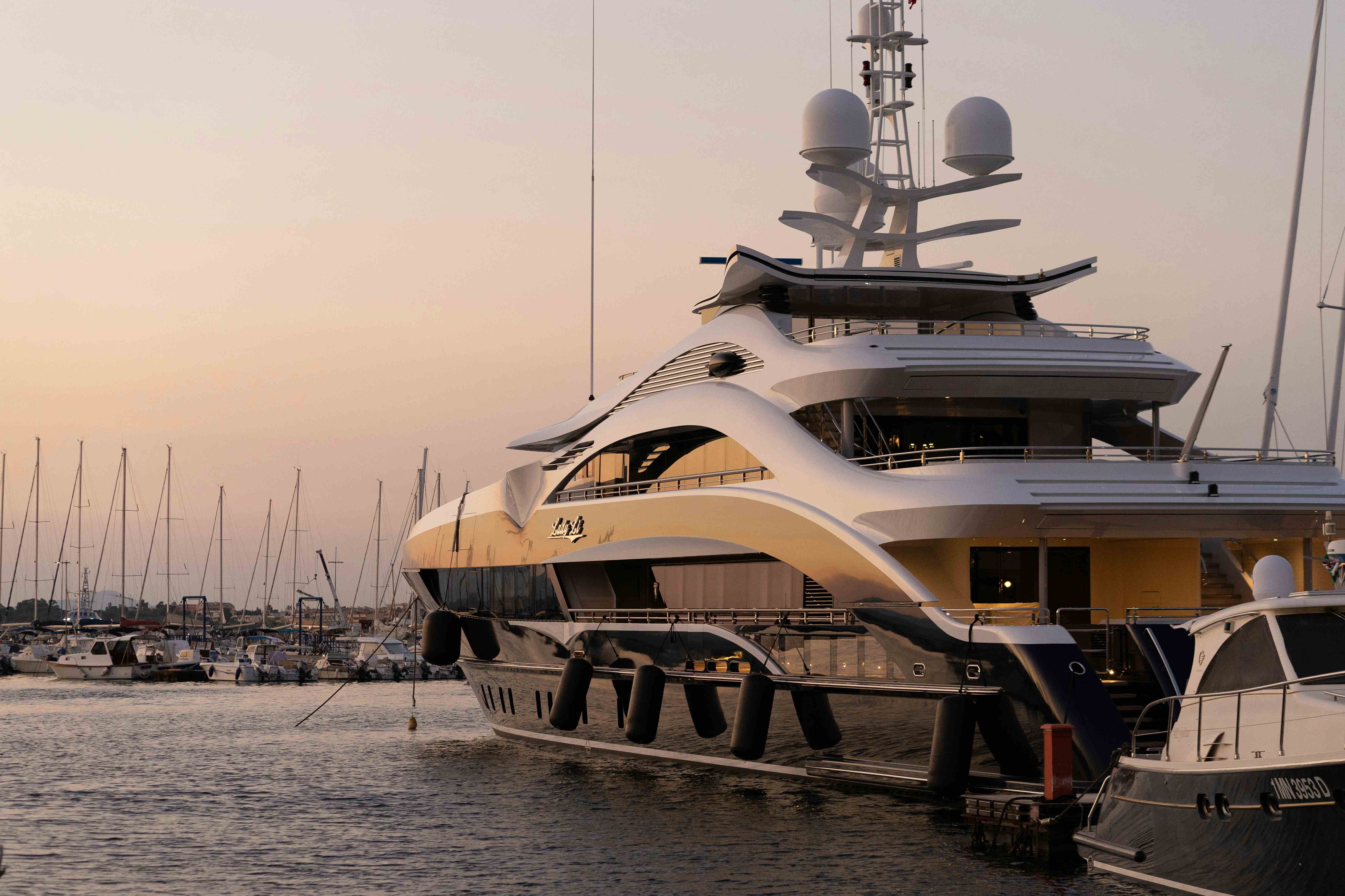 High-value luxury yacht moored in Göcek marina during acquisition and ownership transfer process