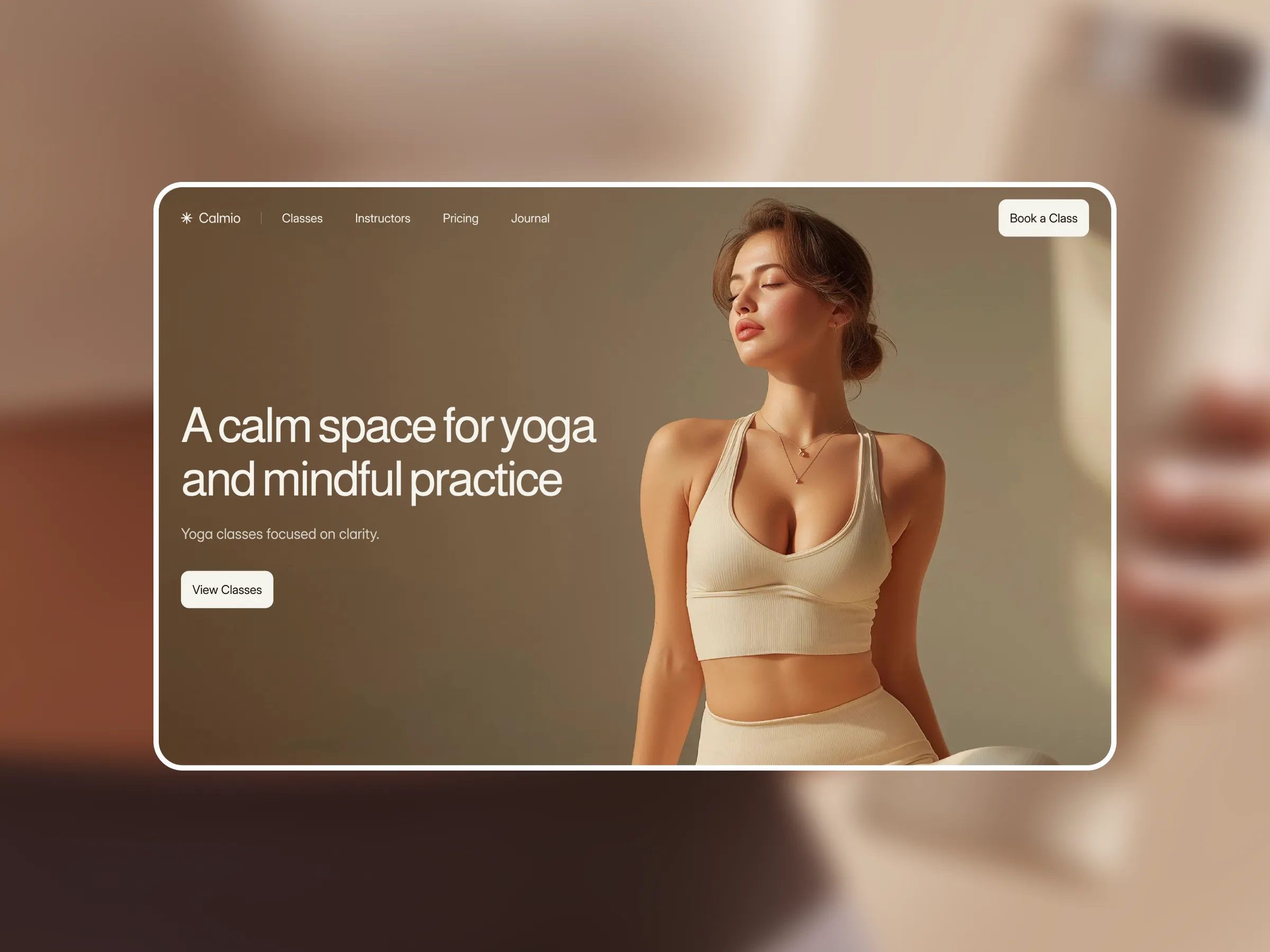 Yoga and wellness website homepage example with calm neutral tones, clear headline, and visible booking button.