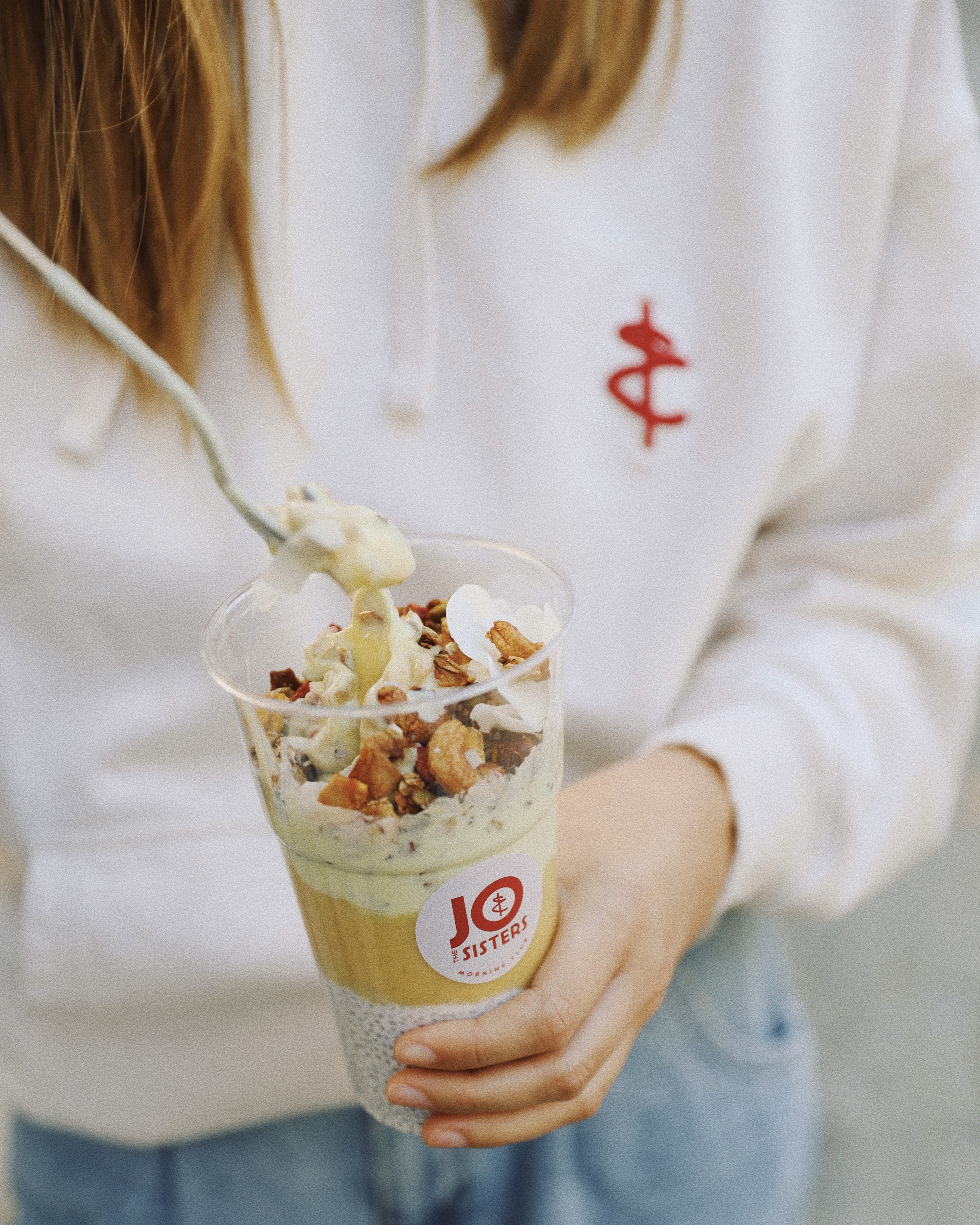 a group of people holding glasses with drinks in them