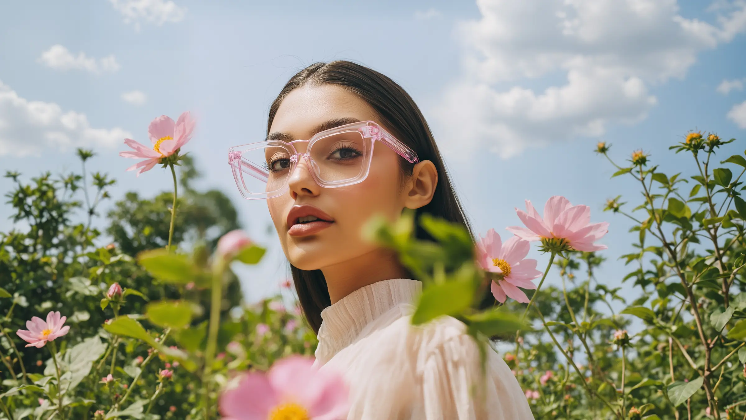 Woman in sunlight with flowers
