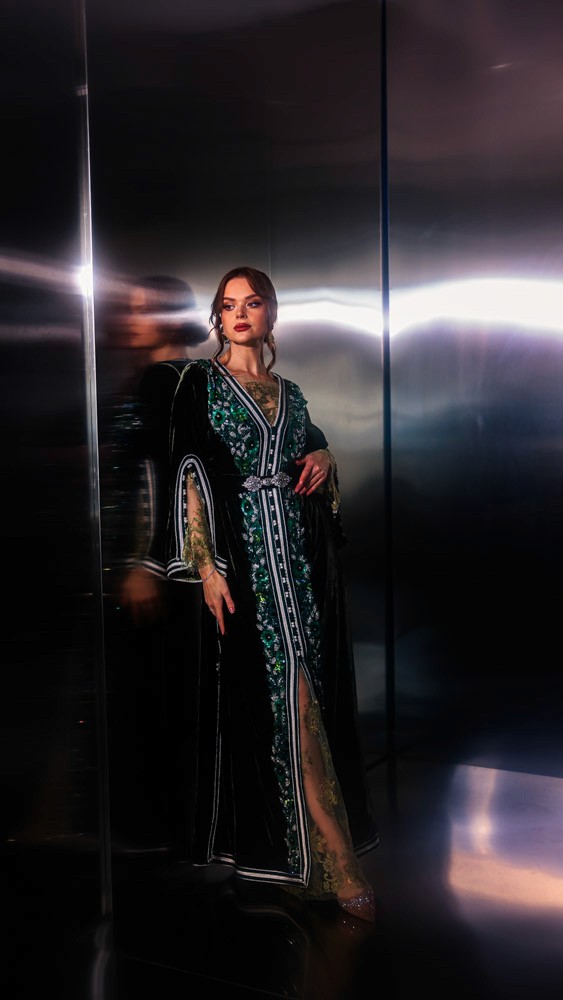 Deep Green Moroccan caftan with emerald embroidery, handcrafted luxury design combining Bahrain atelier and Moroccan craftsmanship