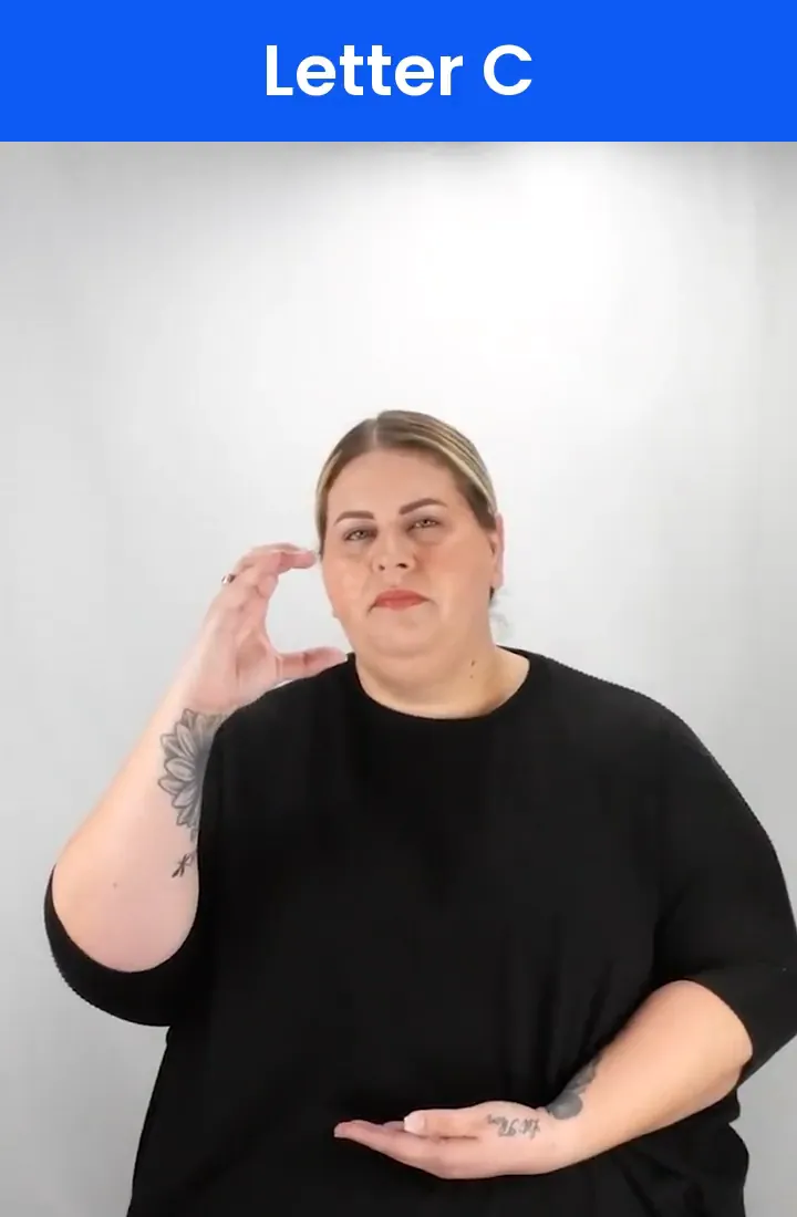 A Deaf signer signs C in ASL