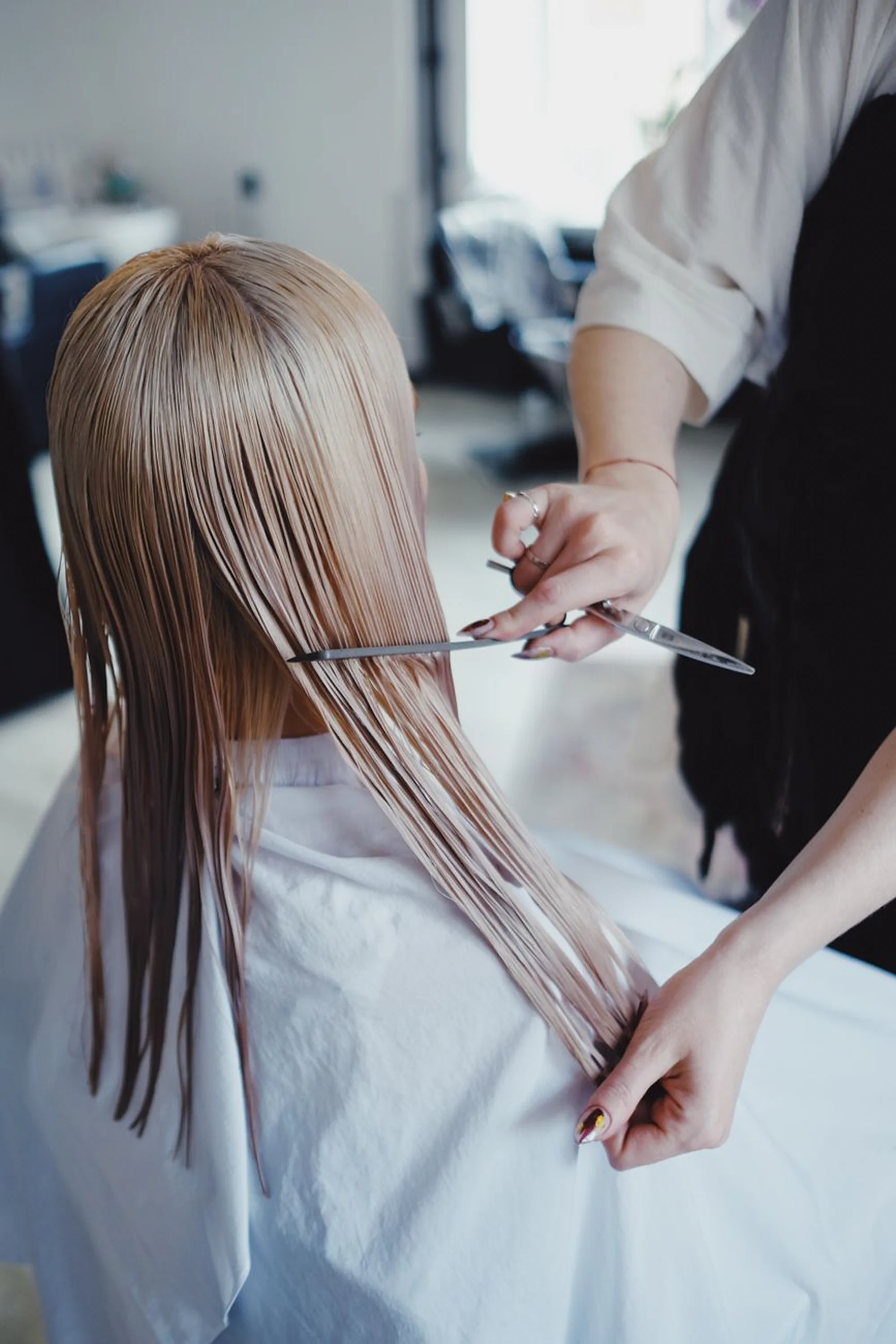 Woman with smooth straightened hair after a smoothing service