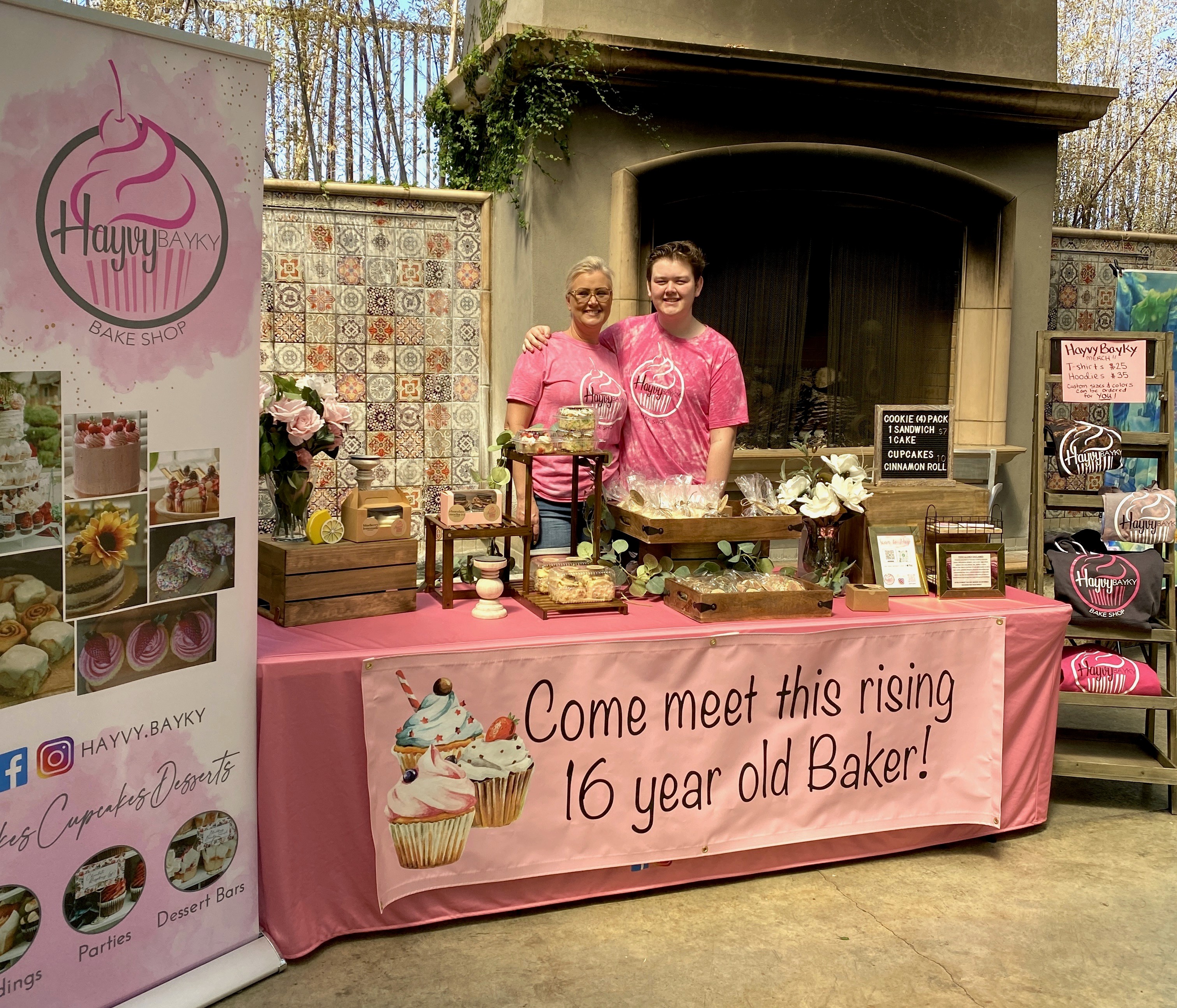 Barista pouring milk into striped ceramic mug