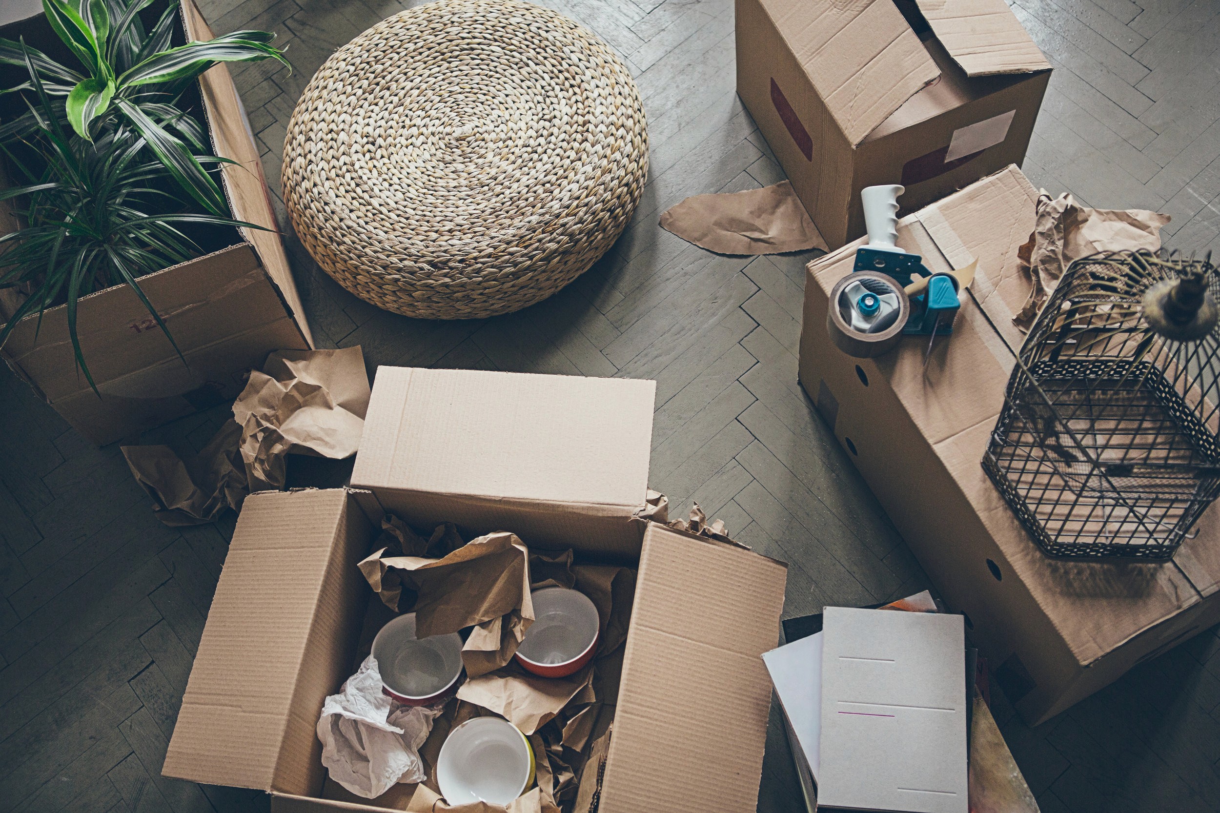 Moving boxes in various states of packed and unpacked