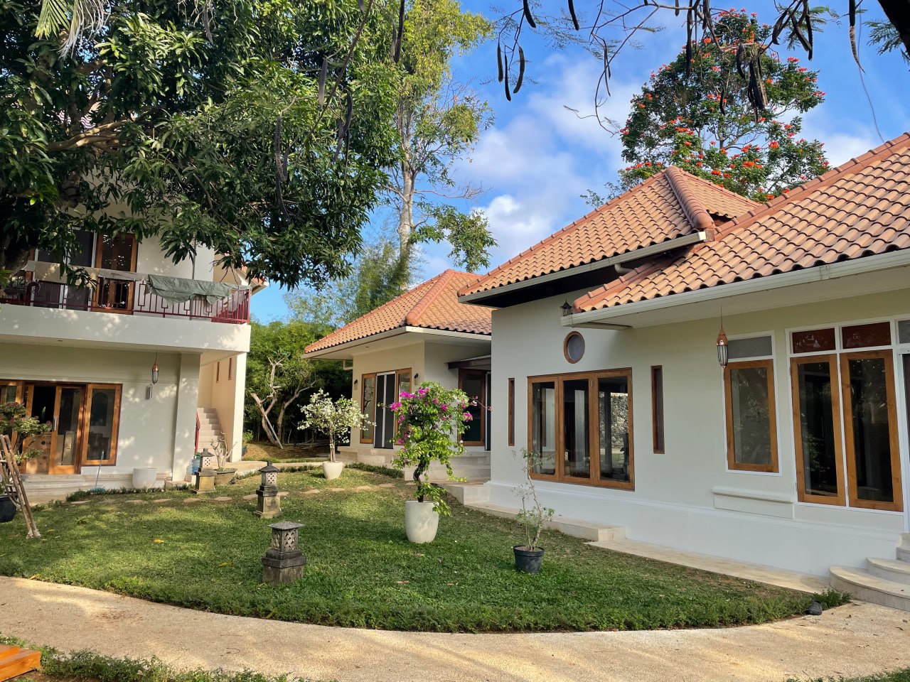 A 4-bedroom villa in a gated complex in Nusa Dua, featuring a large private garden and a peaceful residential environment