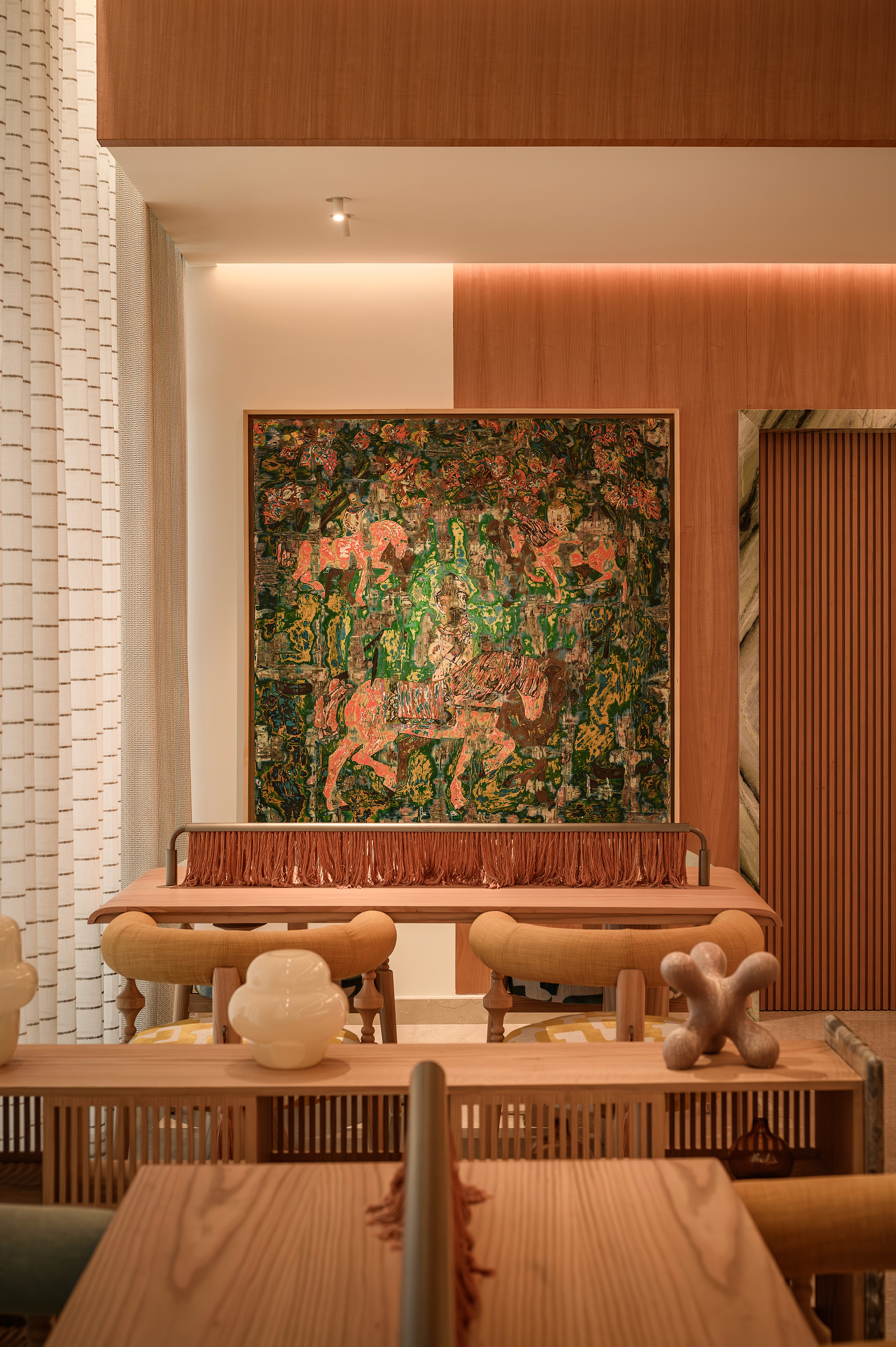 The wedding backdrop is the open sea, shimmering under late afternoon light