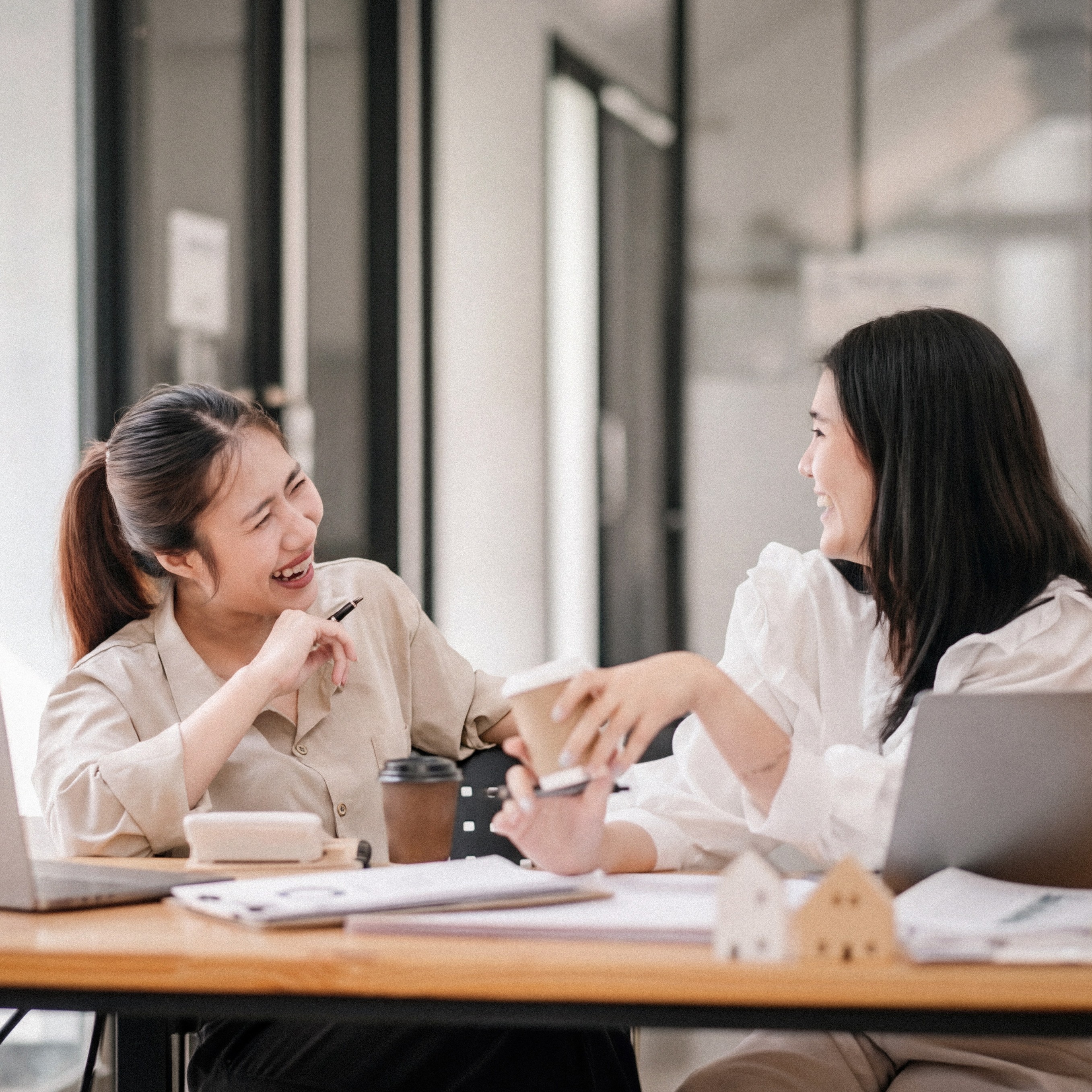A student taking a thoughtful break with coffee while studying at 612 Academy, expressing calm and balance in learning.