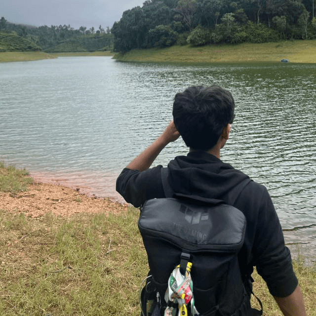 man standing near window during daytime