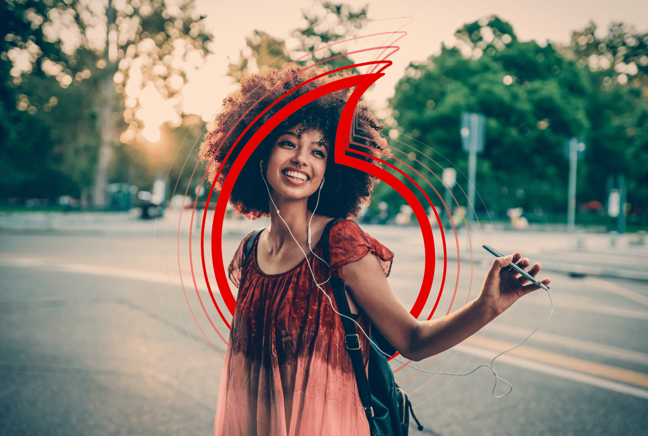 a pair of ear buds sitting on top of a red surface