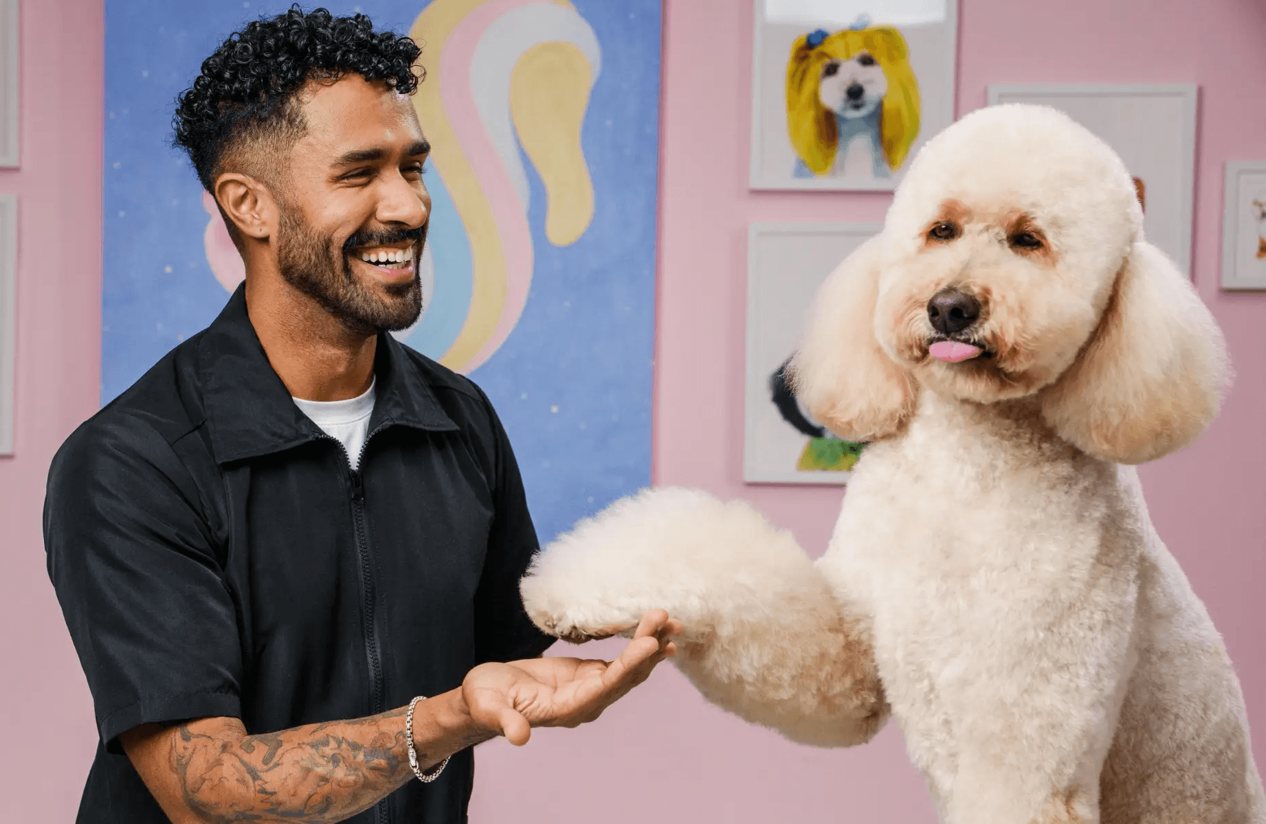 Colorful grooming salon interior with orange and magenta walls to convey creativity, warmth, and the vibrant personality of the brand.