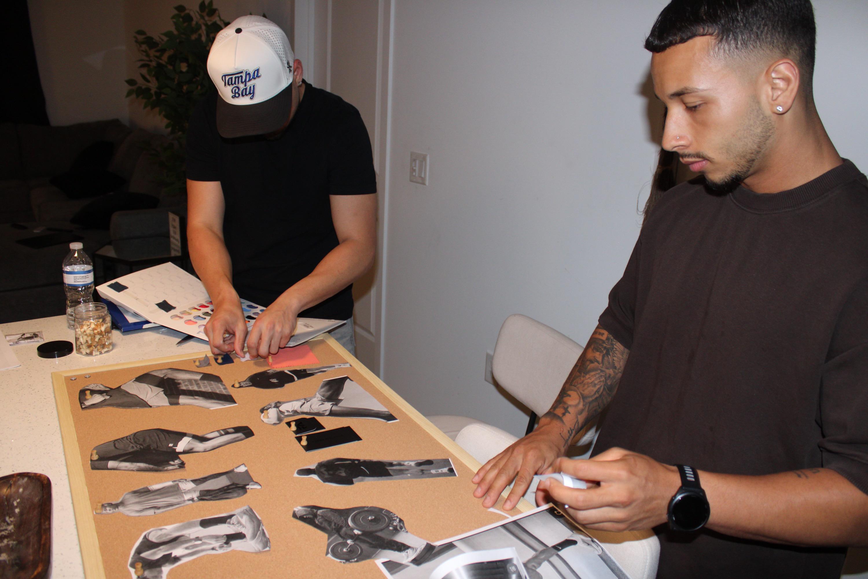 An image of the two founders creating a moodboard around their upcming clothing brand named Forma Athletics