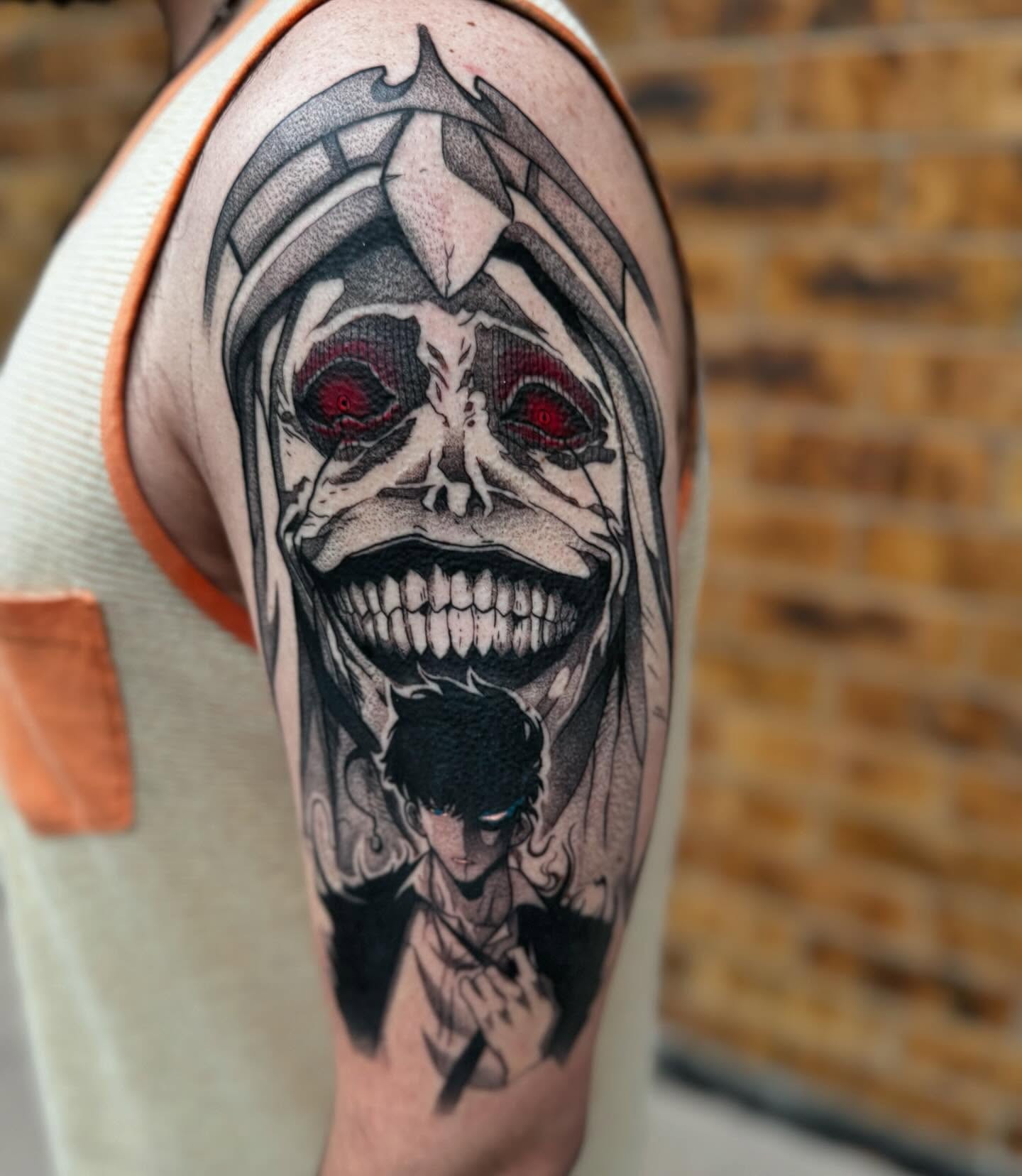 A forearm tattoo of Nezuko Kamado from Demon Slayer, depicted in a stylized anime art style. She is holding a sword.