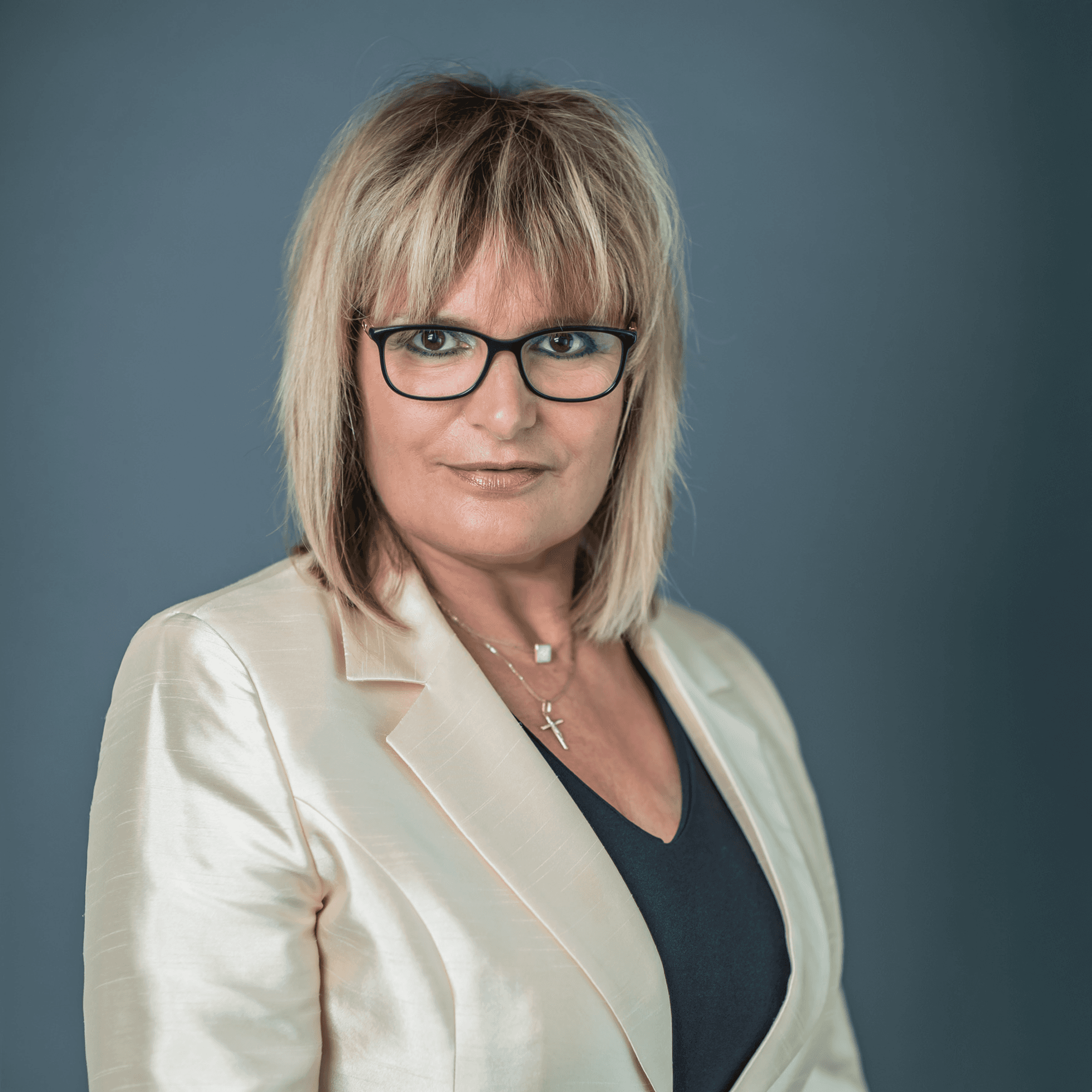 woman in white crew neck shirt smiling
