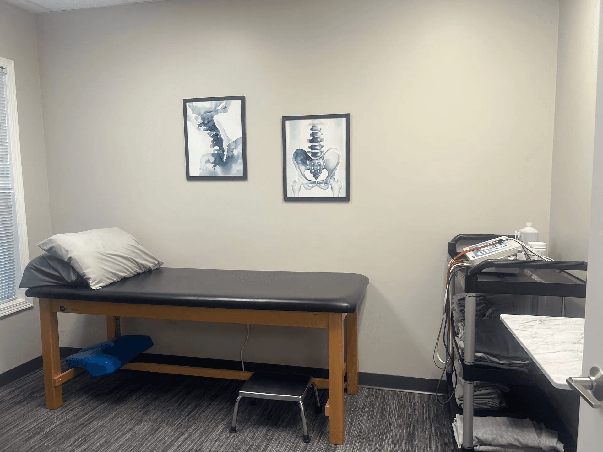 A quiet, private therapy suite entrance with a "Treatment in Progress" sign to ensure patient confidentiality during sessions.