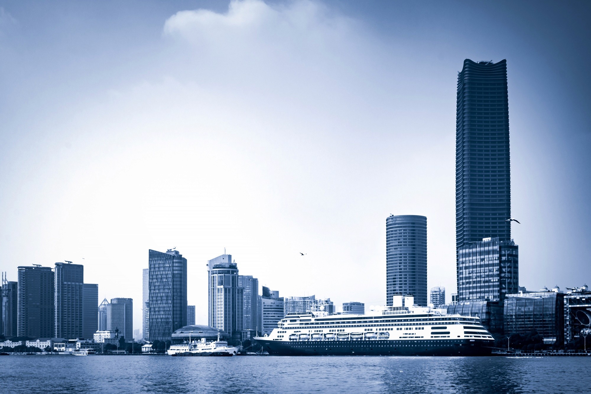 Modern white house floating in the sky with large windows and staircase, representing luxury and innovative design.