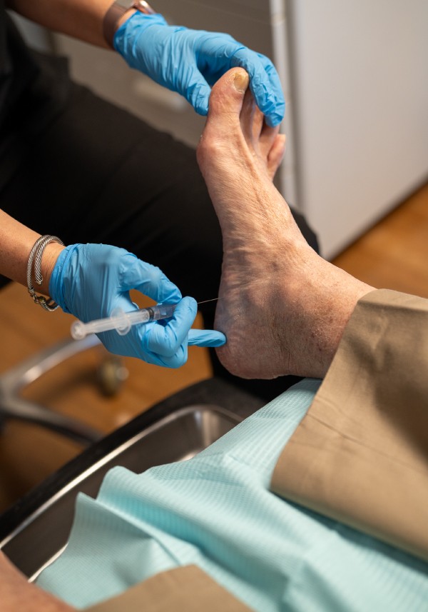 A happy doctor and baby patient
