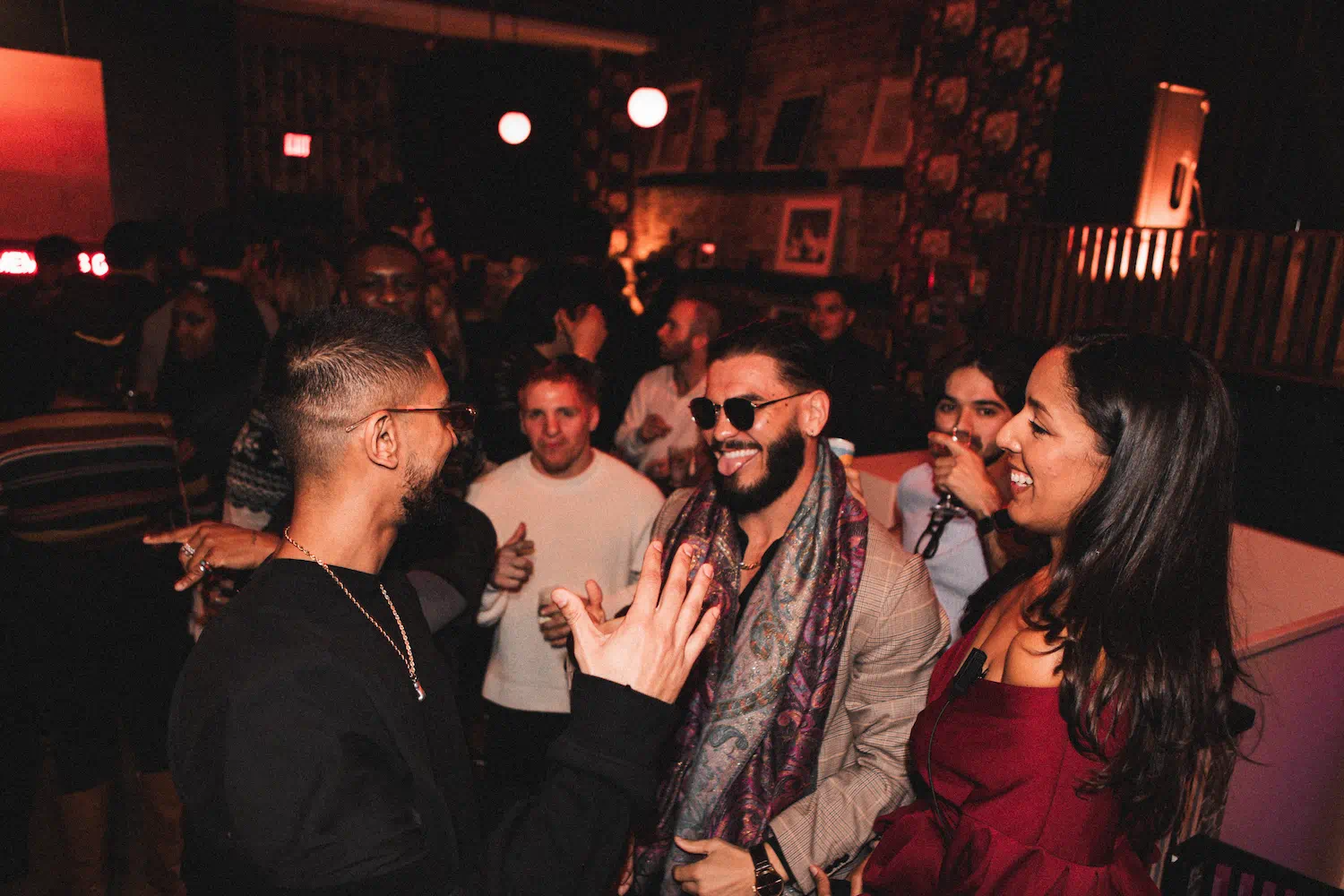 Three men standing in a field