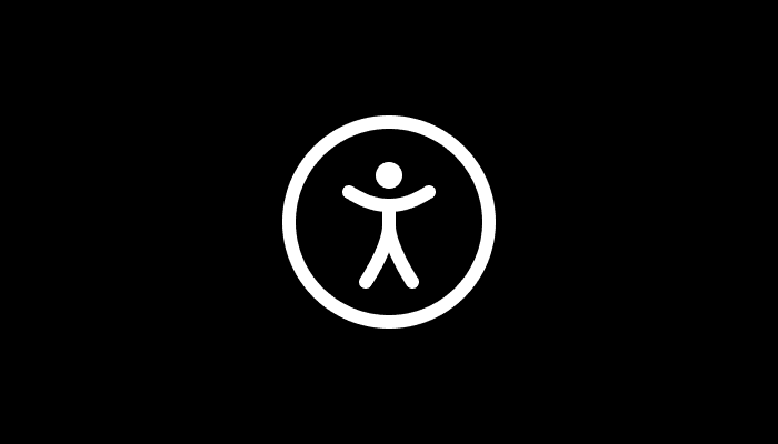 White accessibility icon featuring a stylized human figure inside a circle.