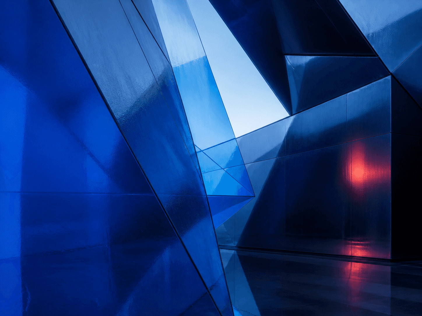Abstract blue architectural planes and reflected light