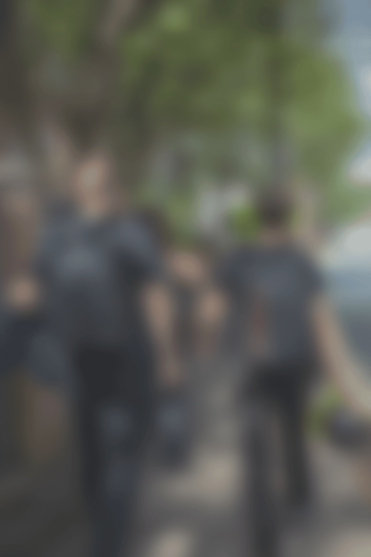 Modern spiral staircase with wooden accents and lighting