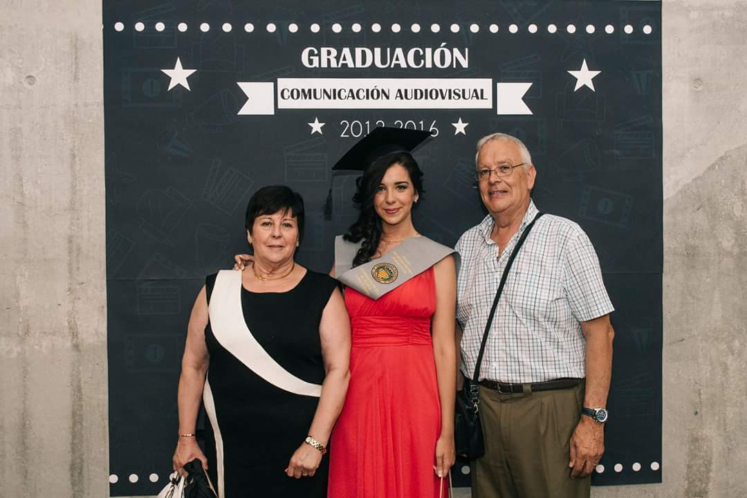 Lorena's graduation, wearing the University's gown