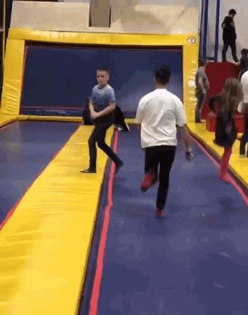 Man Running at Trampoline Park