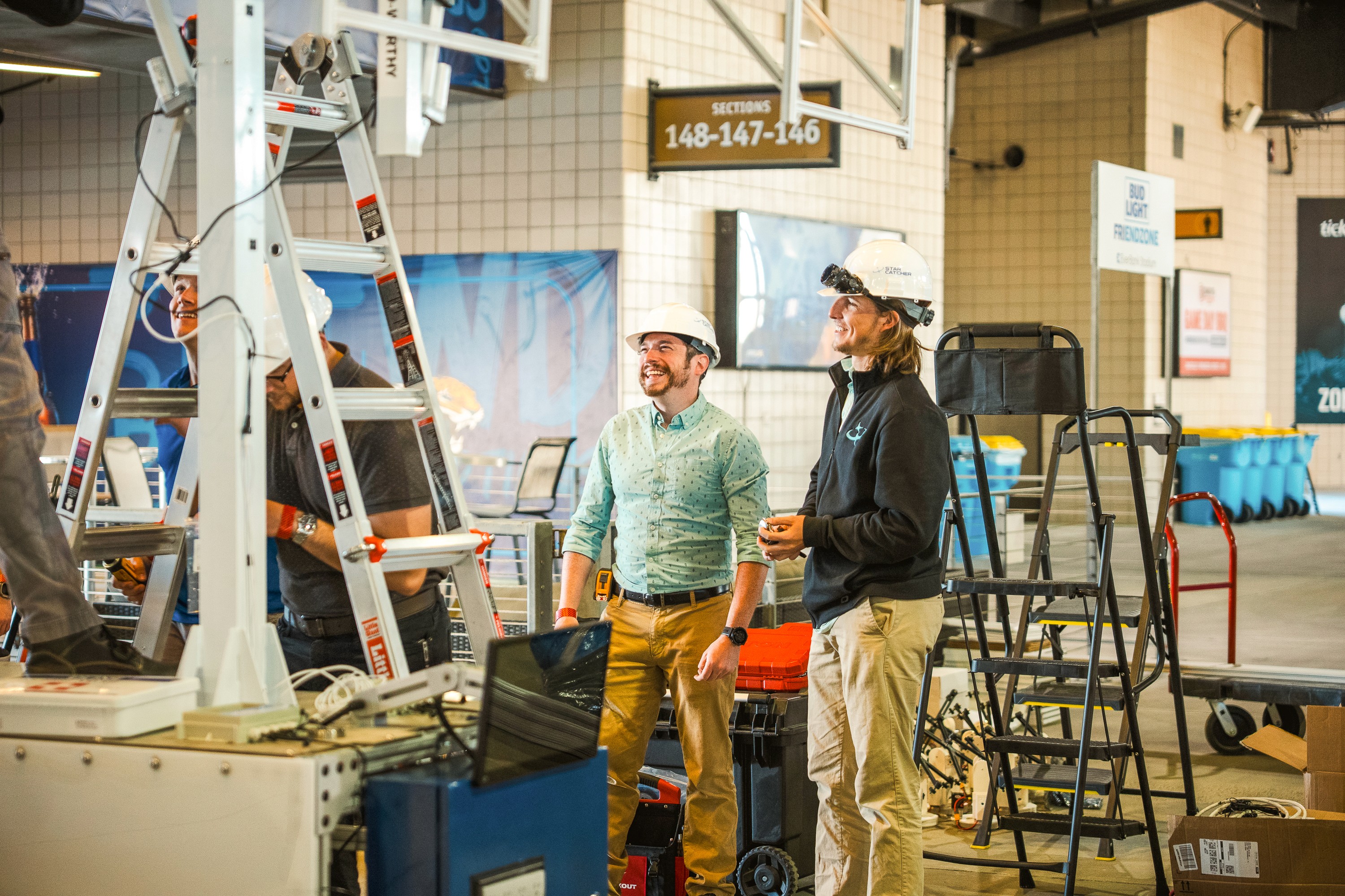 Star Catcher engineers assembling hardware at EverBank stadium for first public demo