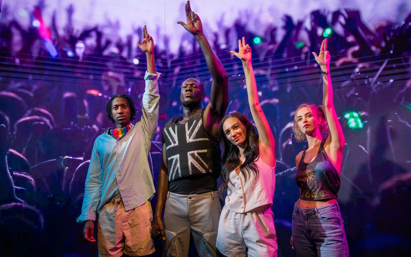Stormzy wax figure at Madame Tussauds London with interactive display.