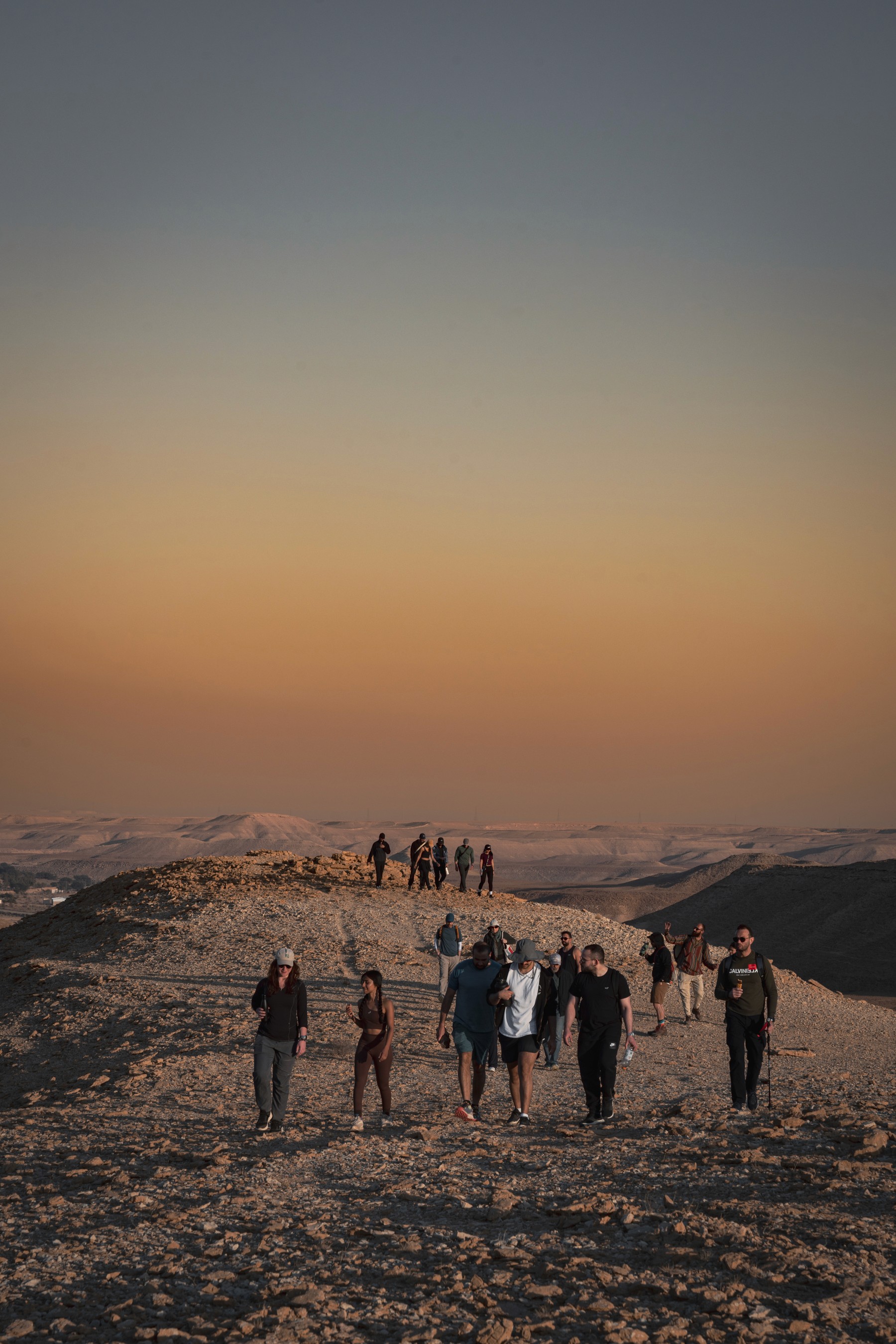 brown sand under blue sky during night time