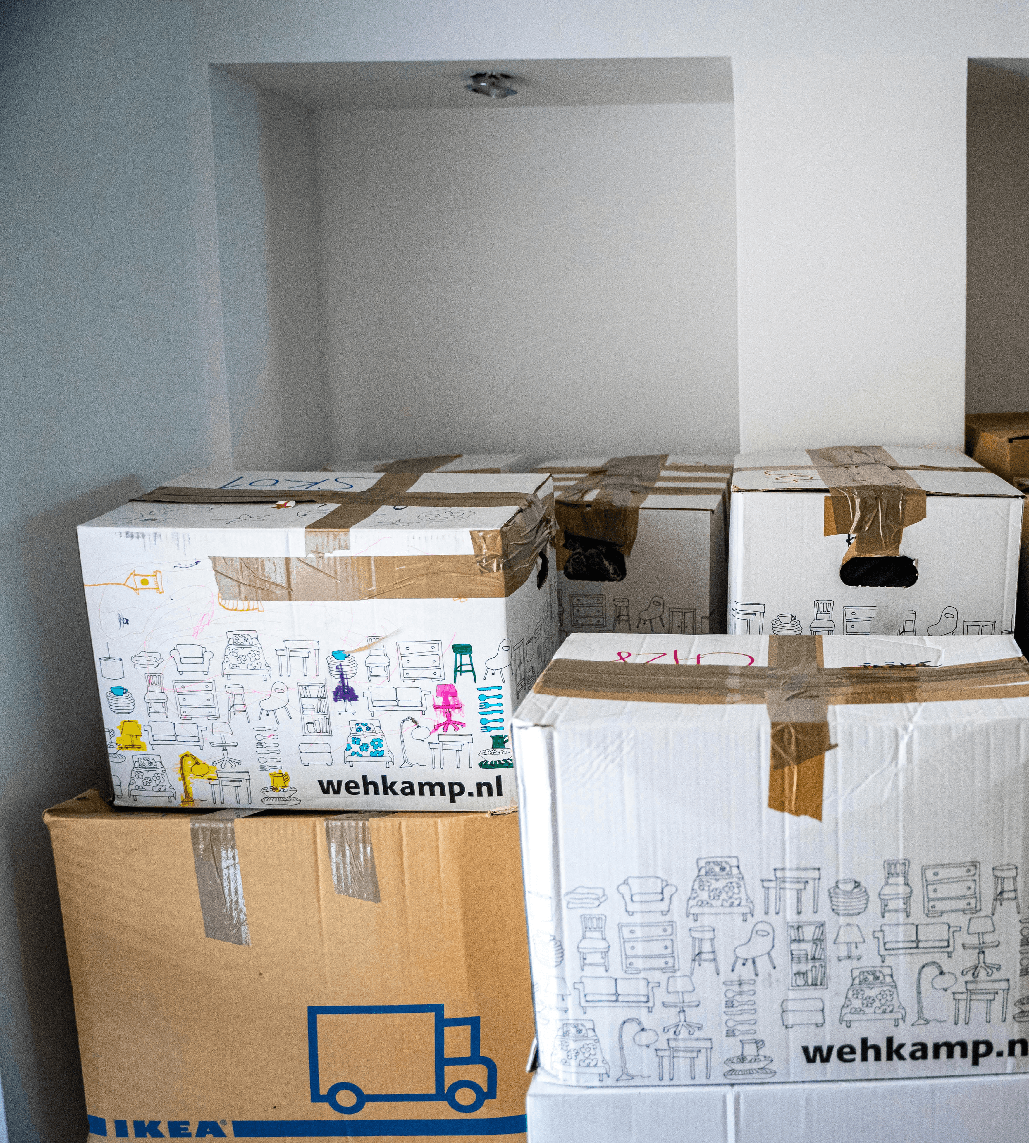 brown cardboard boxes on brown wooden table