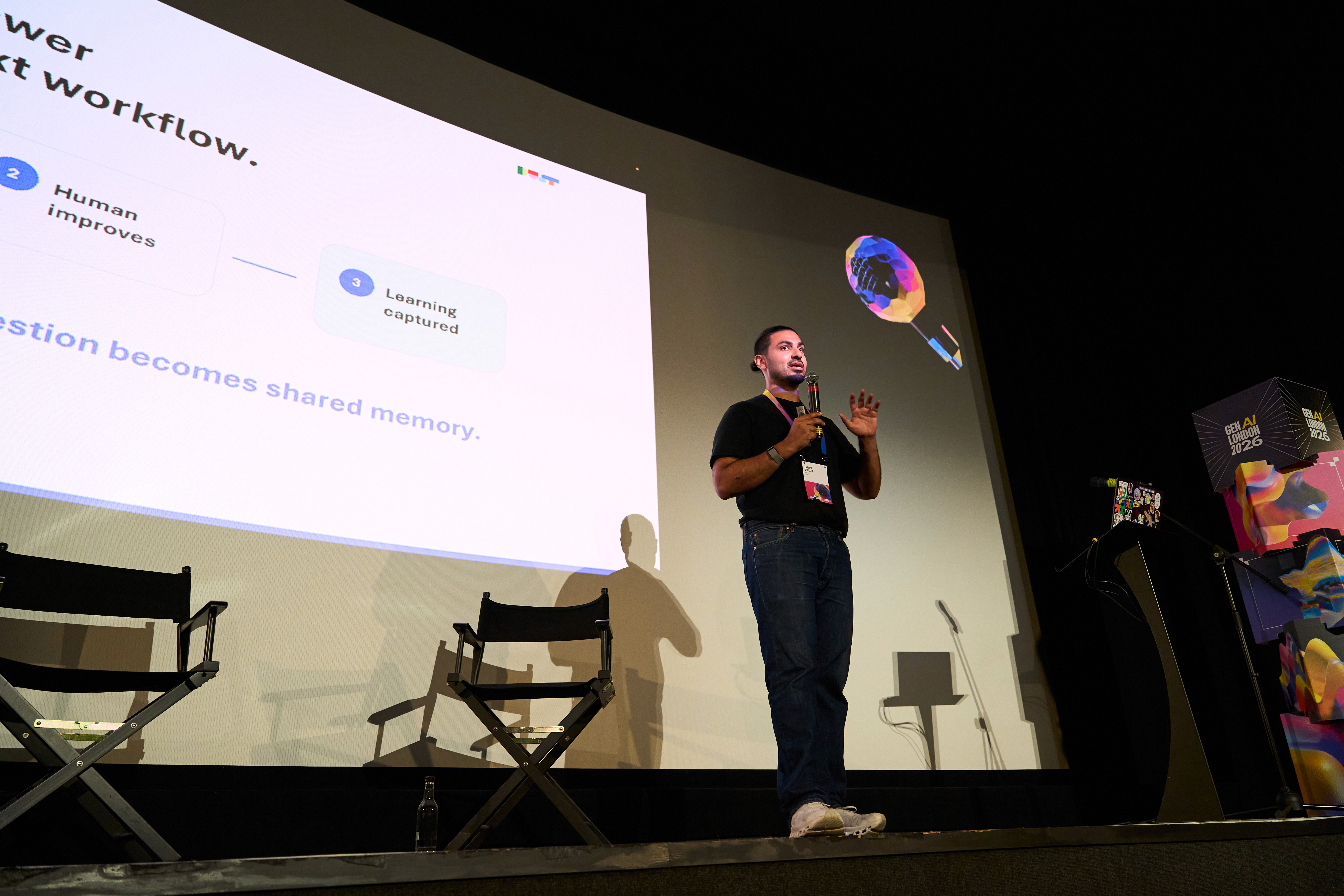 Faateh Dhillon of Dust speaking on stage at the GenAI London 2026 Warm Up