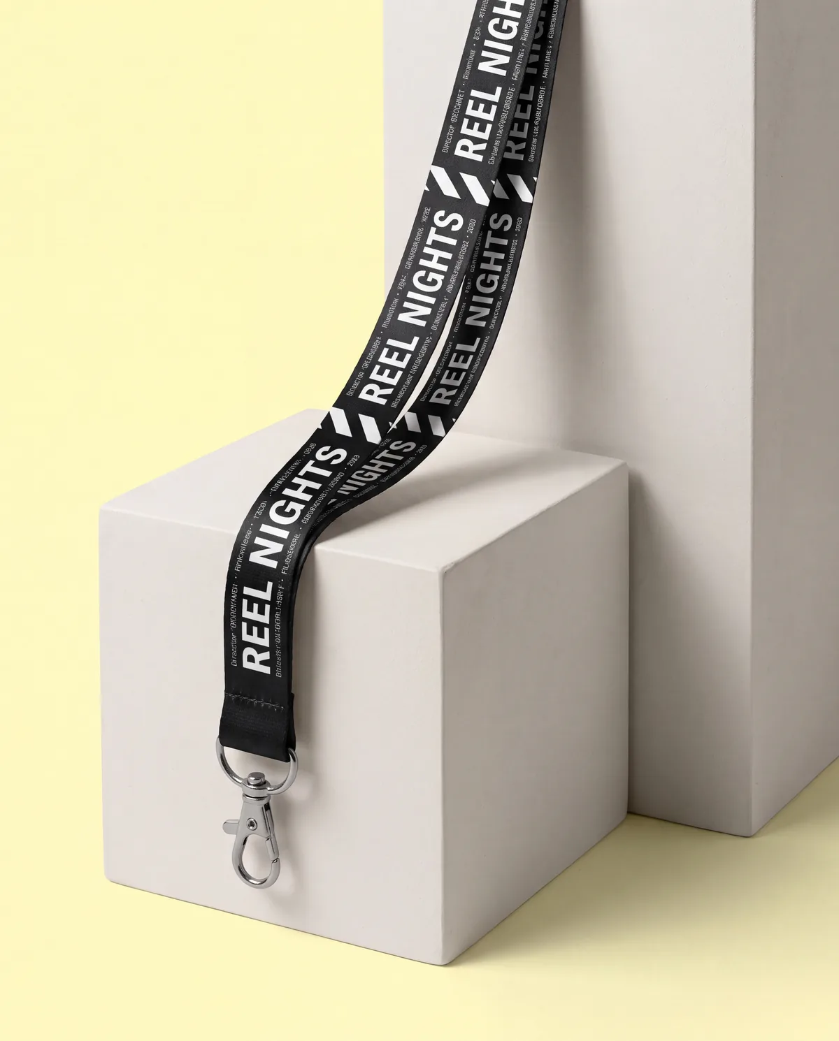Black lanyard with white print and swivel hook