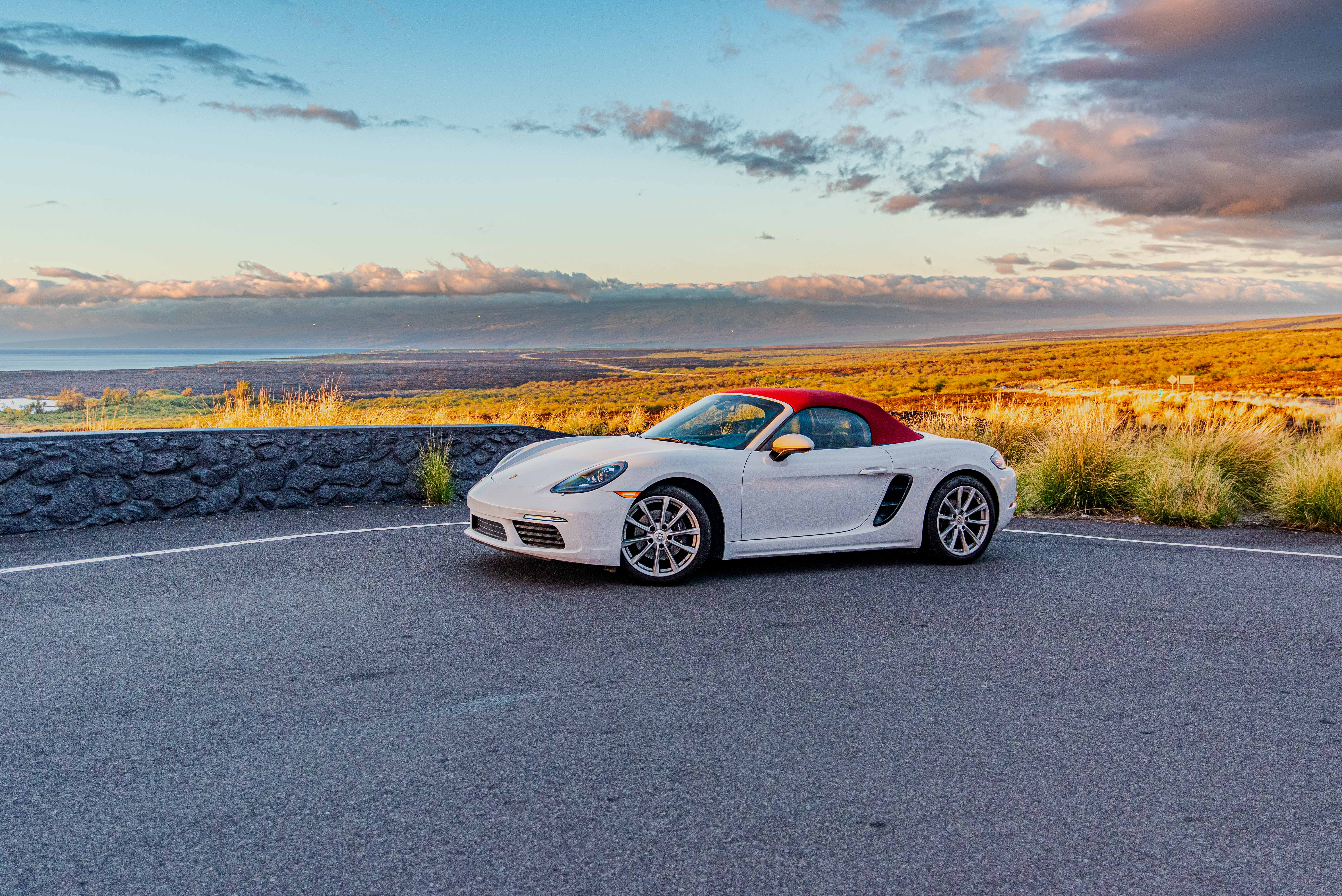 White Porsche Boxster Under Sunset Hawaii Big Island For Rent