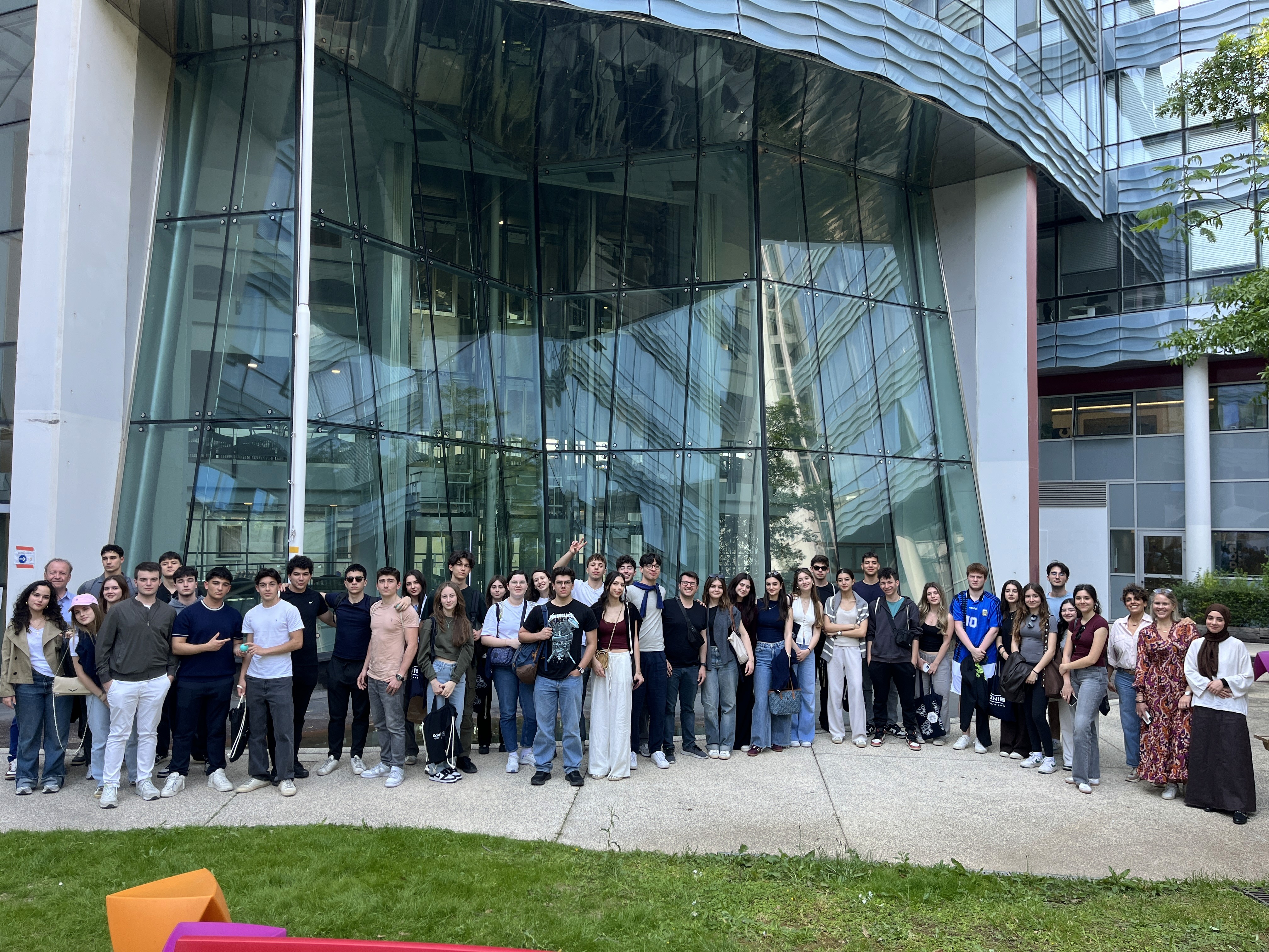 a man and woman looking at a laptop