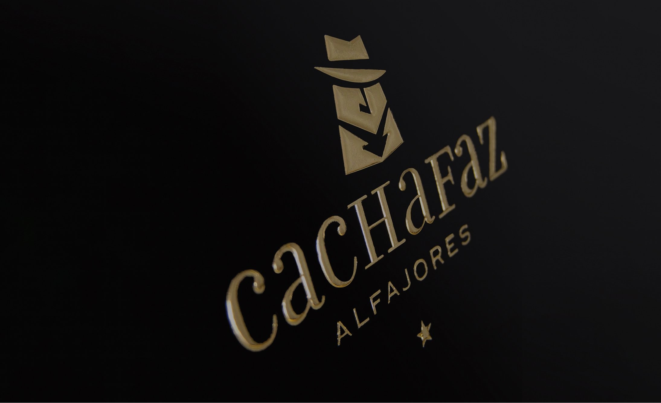 Gold logo on black background features a geometric figure resembling a person with a hat above the words "Cachafaz Alfajores," conveying elegance.