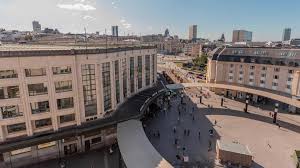 a building with trees and plants