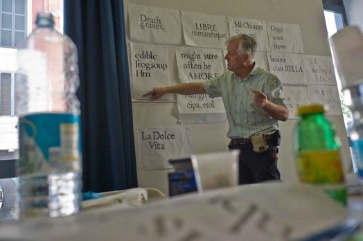 man pointing at letter paper