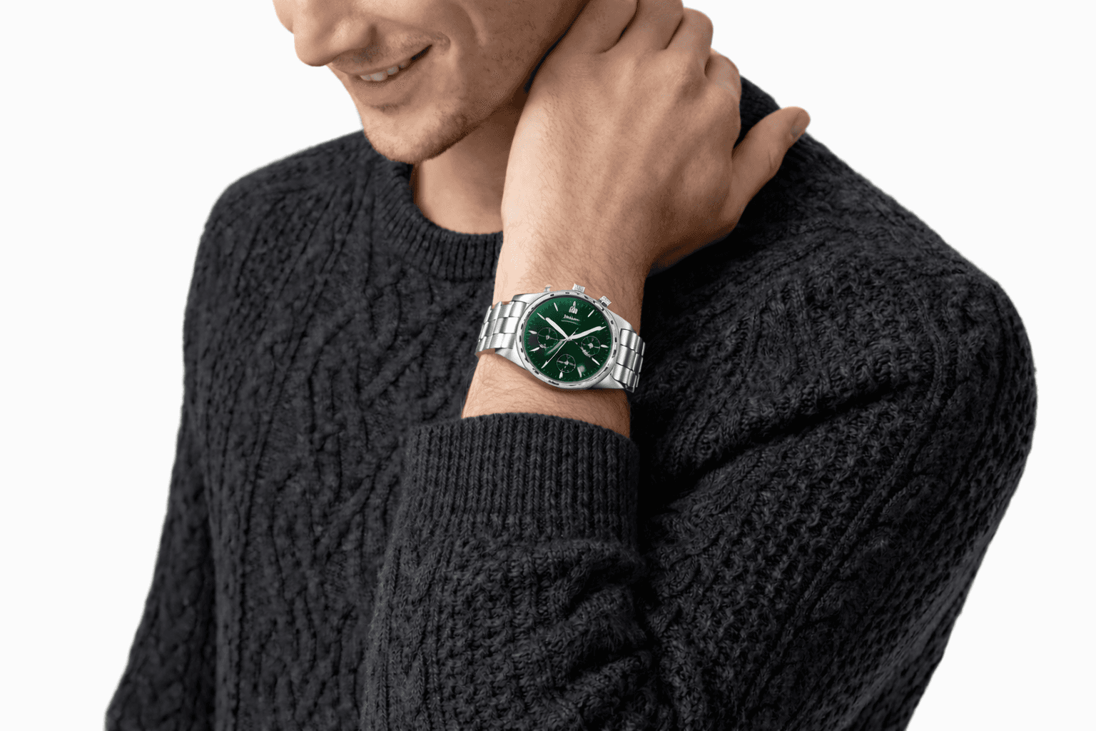 green ALTURA on a man's wrist wearing black