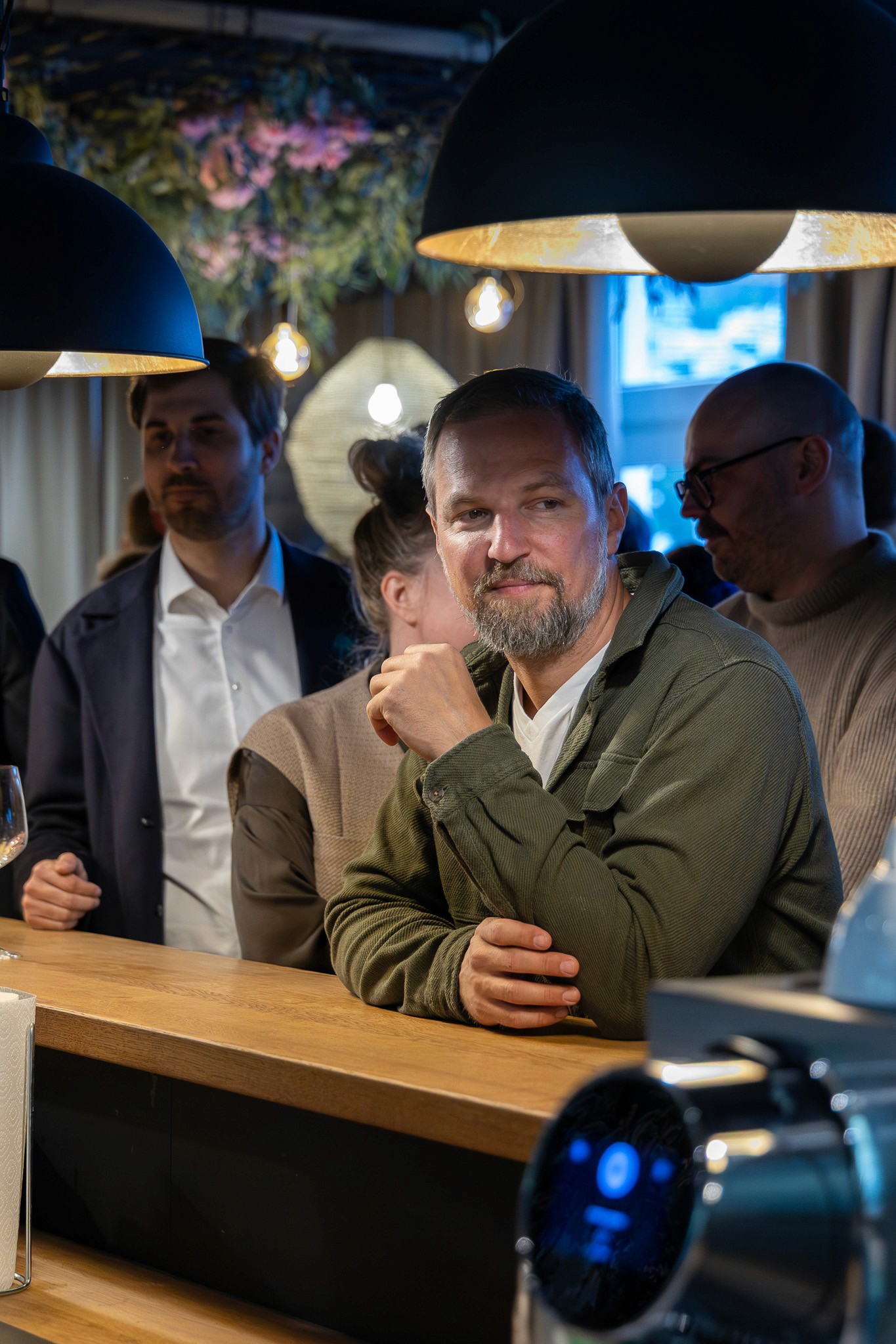 Guest attending a networking reception during a blockchain event in Zug.